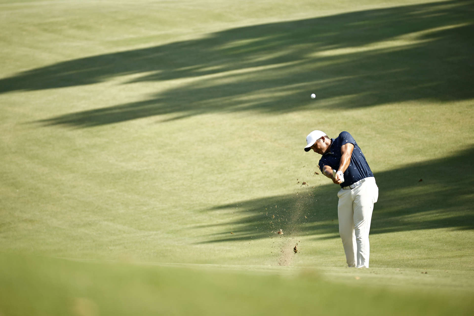 GREENSBORO, NORTH CAROLINA - AUGUST 13: Jhonattan Vegas of Venezuela plays an approach shot on the 17th hole during the second round of the Wyndham Championship at Sedgefield Country Club on August 13, 2021 in Greensboro, North Carolina. (Photo by Jared C. Tilton/Getty Images)