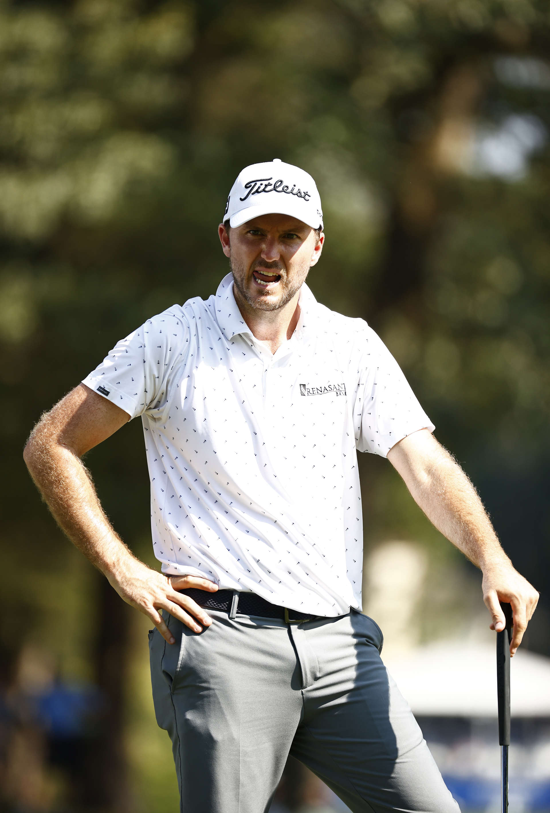 GREENSBORO, NORTH CAROLINA - AUGUST 13: Russell Henley of the United States looks on from the 17th green during the second round of the Wyndham Championship at Sedgefield Country Club on August 13, 2021 in Greensboro, North Carolina. (Photo by Jared C. Tilton/Getty Images)
