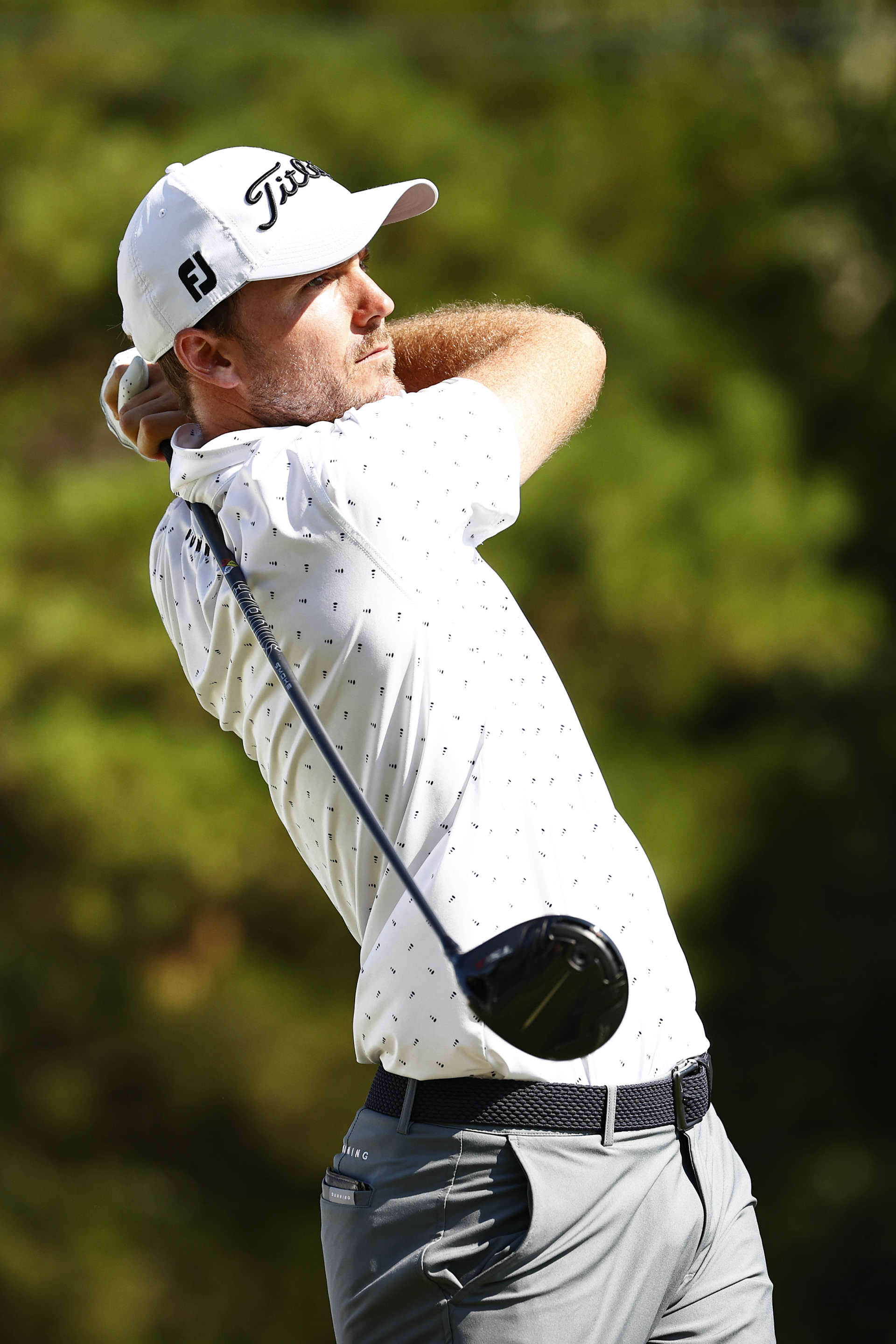 GREENSBORO, NORTH CAROLINA - AUGUST 13: Russell Henley of the United States plays his shot from the 18th tee during the second round of the Wyndham Championship at Sedgefield Country Club on August 13, 2021 in Greensboro, North Carolina. (Photo by Jared C. Tilton/Getty Images)