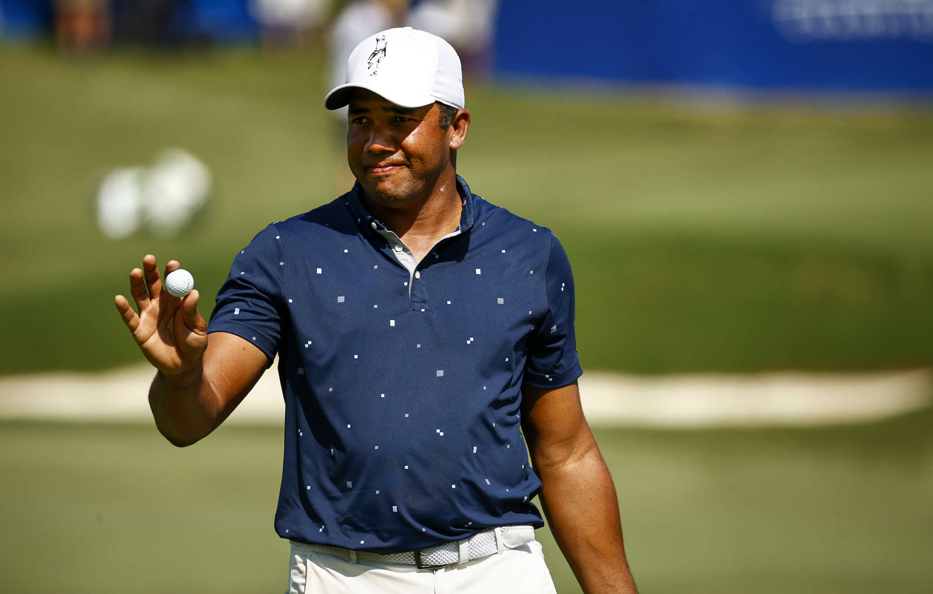 GREENSBORO, NORTH CAROLINA - AUGUST 13: Jhonattan Vegas of Venezuela waves after making a putt for birdie on the 15th green during the second round of the Wyndham Championship at Sedgefield Country Club on August 13, 2021 in Greensboro, North Carolina. (Photo by Jared C. Tilton/Getty Images)