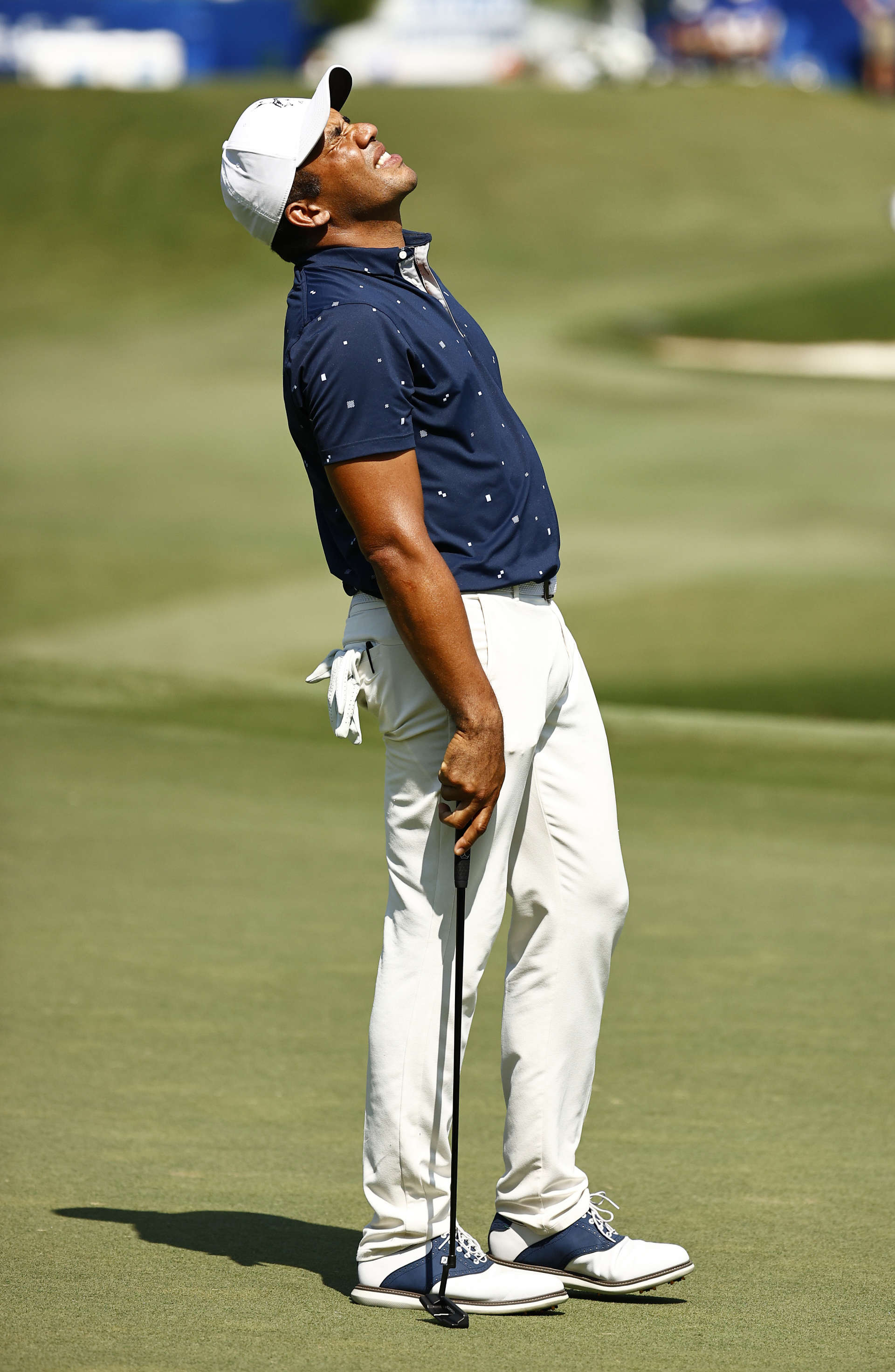 GREENSBORO, NORTH CAROLINA - AUGUST 13: Jhonattan Vegas of Venezuela reacts to a missed putt for eagle on the 15th green during the second round of the Wyndham Championship at Sedgefield Country Club on August 13, 2021 in Greensboro, North Carolina. (Photo by Jared C. Tilton/Getty Images)