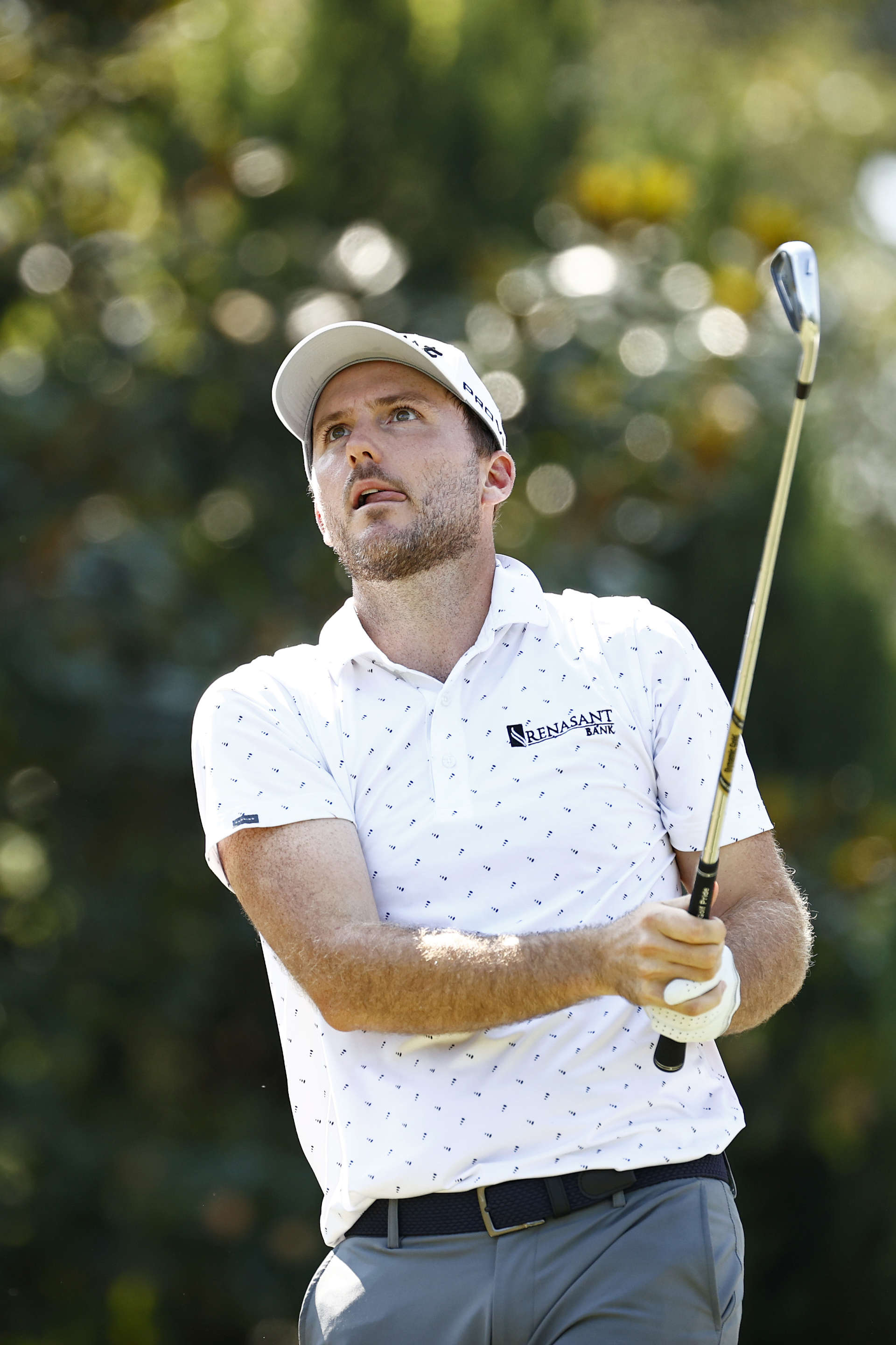 GREENSBORO, NORTH CAROLINA - AUGUST 13: Russell Henley of the United States watches his shot from the 16th tee during the second round of the Wyndham Championship at Sedgefield Country Club on August 13, 2021 in Greensboro, North Carolina. (Photo by Jared C. Tilton/Getty Images)