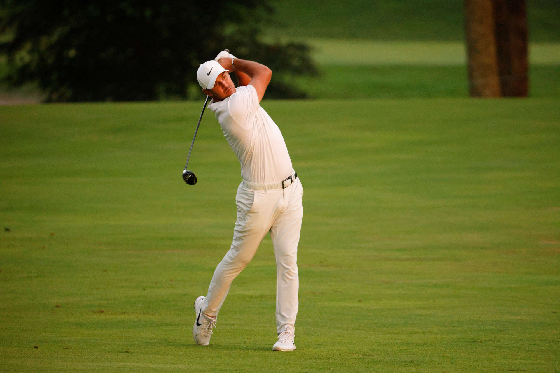 OWINGS MILLS, MARYLAND - AUGUST 27: Brooks Koepka of the United States plays a shot on the 16th hole during the second round of the BMW Championship at Caves Valley Golf Club on August 27, 2021 in Owings Mills, Maryland. (Photo by Cliff Hawkins/Getty Images)