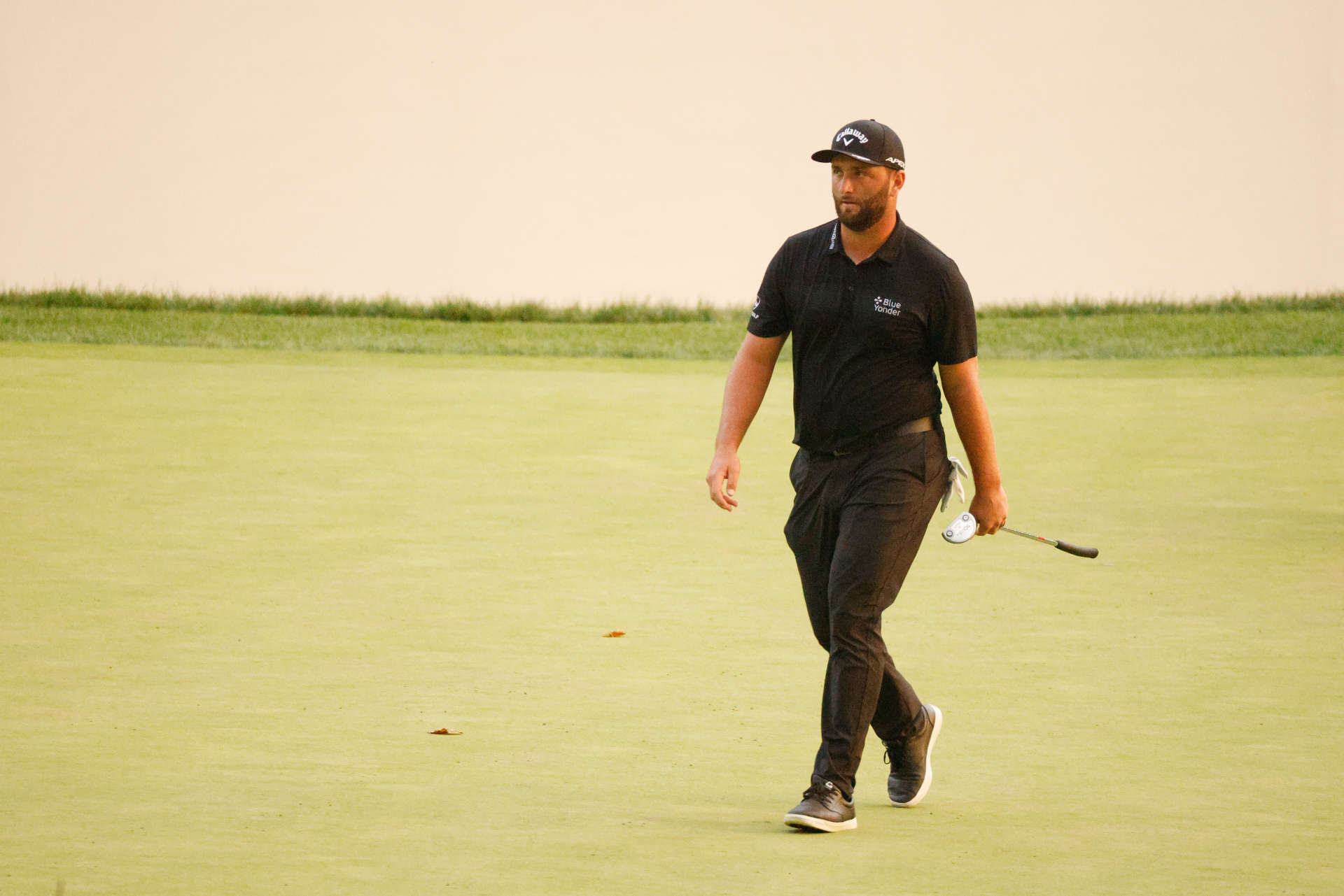 OWINGS MILLS, MARYLAND - AUGUST 27: Jon Rahm of Spain walks on the 15th green during the second round of the BMW Championship at Caves Valley Golf Club on August 27, 2021 in Owings Mills, Maryland. (Photo by Cliff Hawkins/Getty Images)