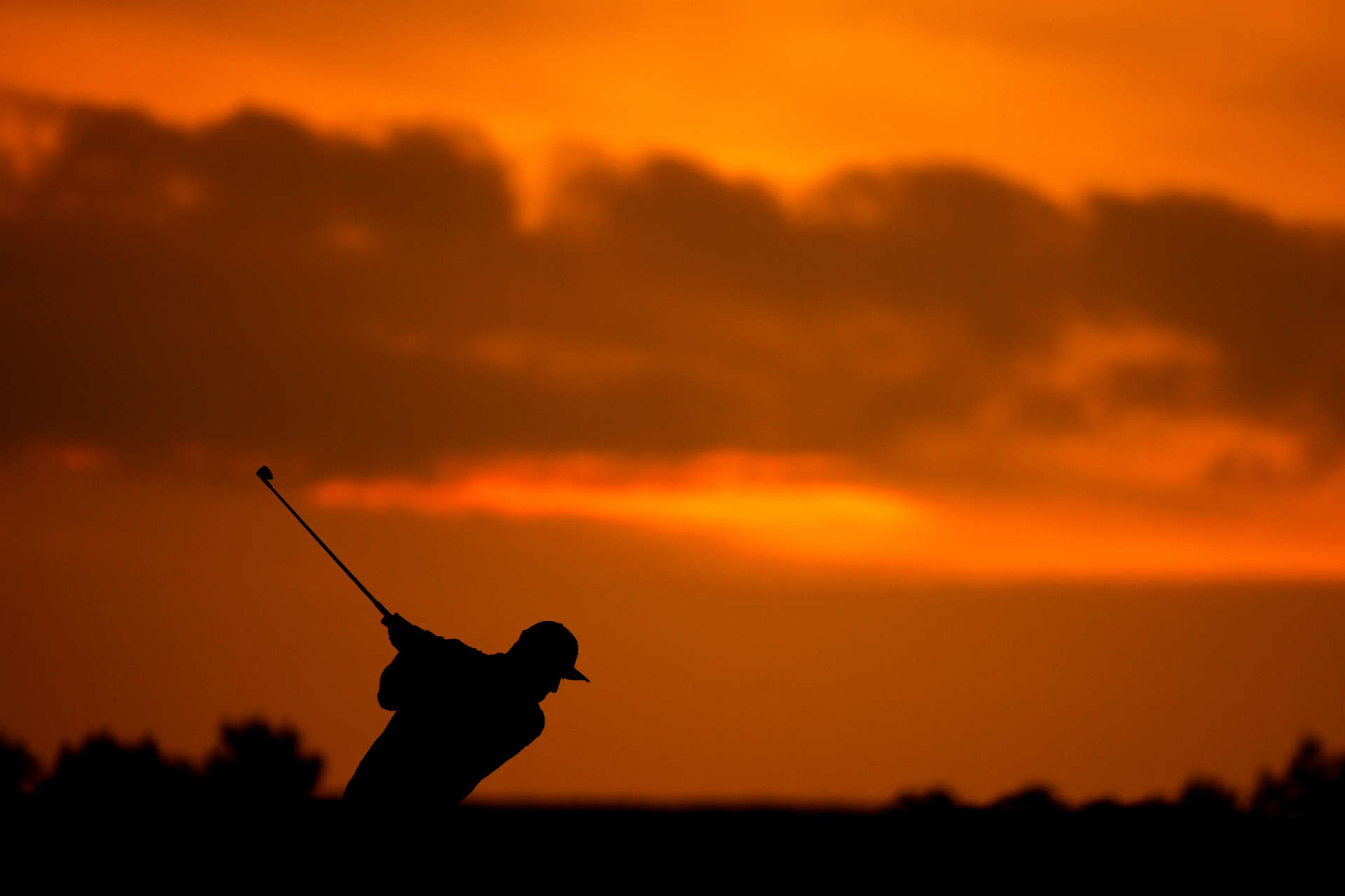 OWINGS MILLS, MARYLAND - AUGUST 27: Jon Rahm of Spain plays a shot on the 16th hole during the second round of the BMW Championship at Caves Valley Golf Club on August 27, 2021 in Owings Mills, Maryland. (Photo by Cliff Hawkins/Getty Images)