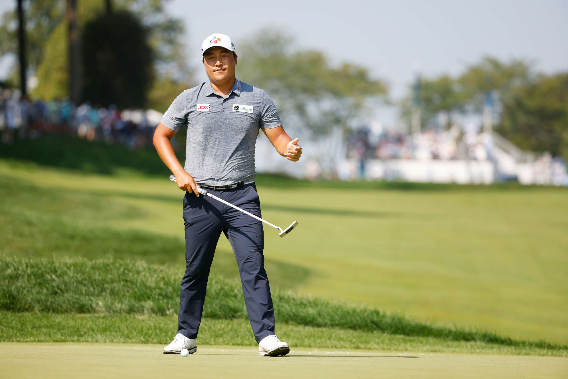OWINGS MILLS, MARYLAND - AUGUST 27: Kyoung-Hoon Lee of South Korea lines up a putt on the first green during the second round of the BMW Championship at Caves Valley Golf Club on August 27, 2021 in Owings Mills, Maryland. (Photo by Cliff Hawkins/Getty Images)