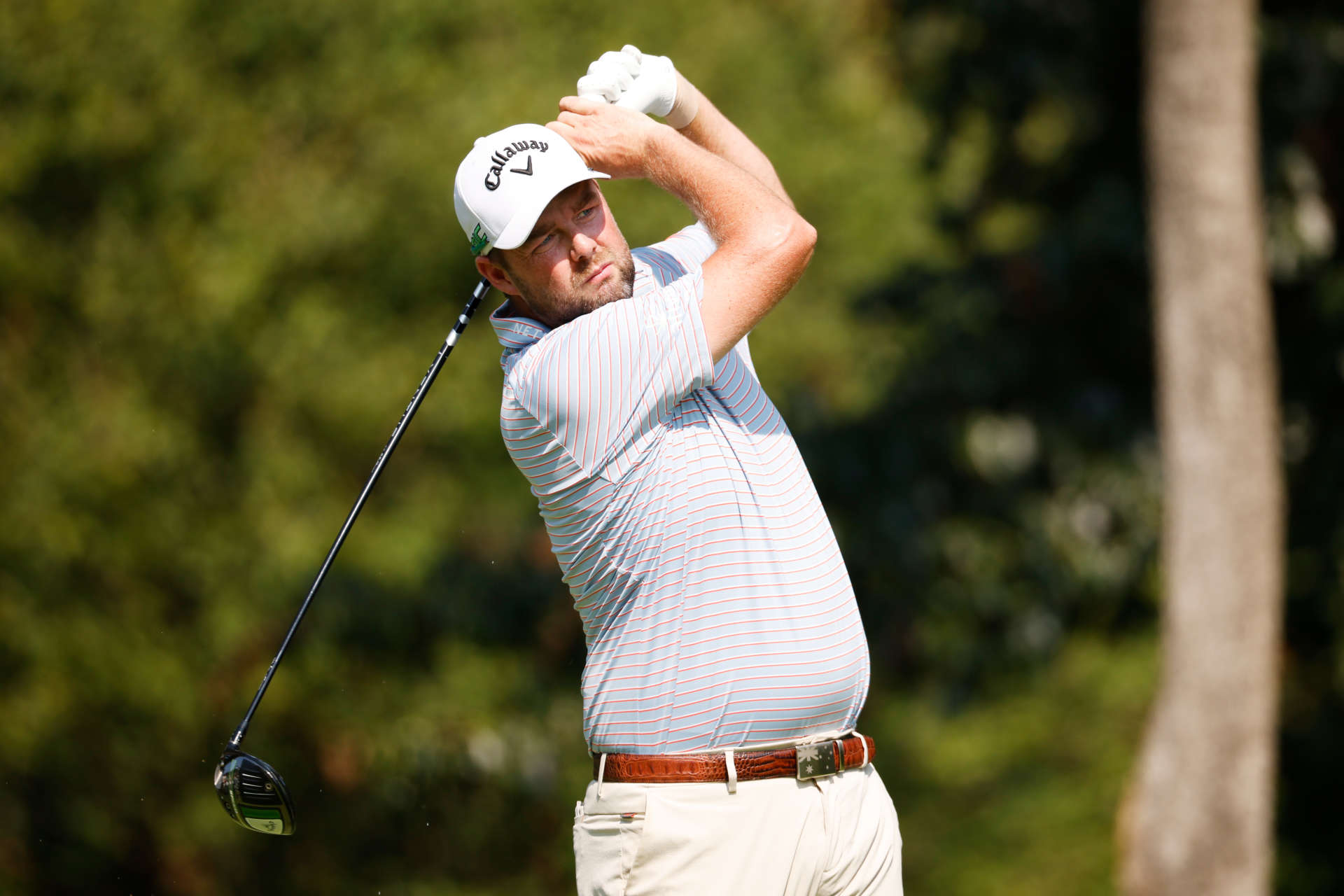 OWINGS MILLS, MARYLAND - AUGUST 27: Marc Leishman of Australia plays his shot from the second tee during the second round of the BMW Championship at Caves Valley Golf Club on August 27, 2021 in Owings Mills, Maryland. (Photo by Cliff Hawkins/Getty Images)