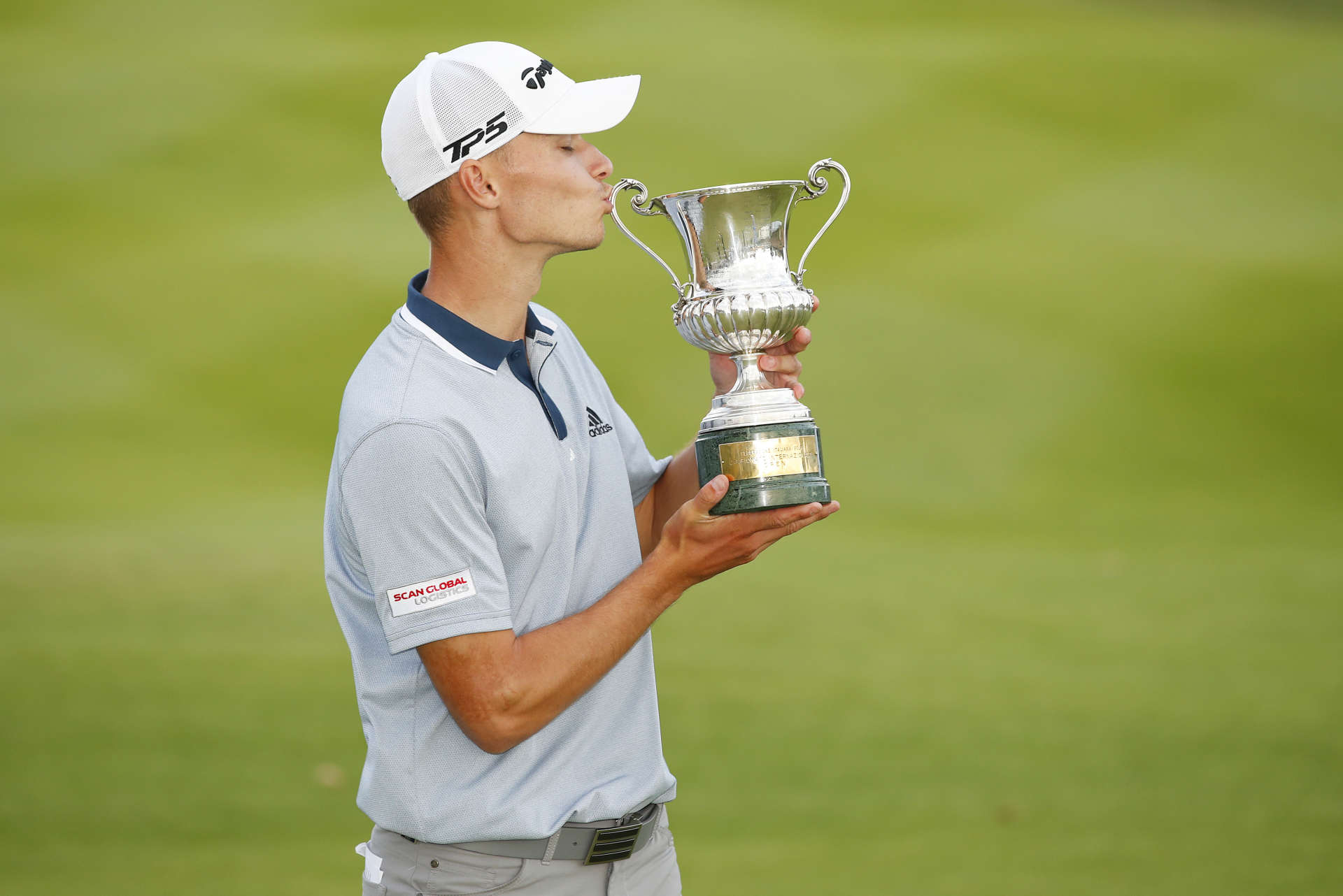 ROME, ITALY - SEPTEMBER 05: Nicolai Hojgaard of Denmark kisses the trophy after Day Four of The Italian Open at Marco Simone Golf Club on September 05, 2021 in Rome, Italy. (Photo by Luke Walker/Getty Images)