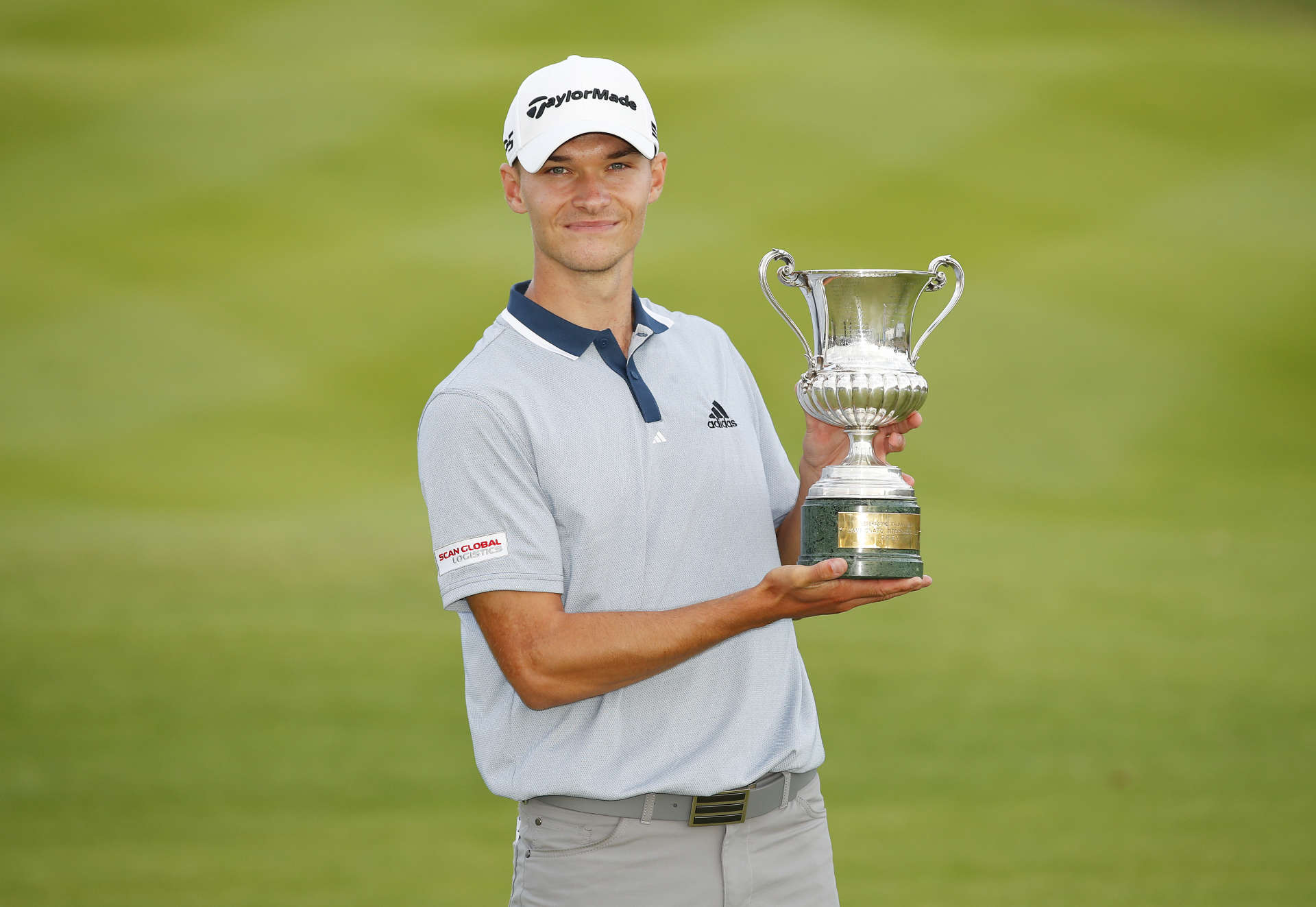 ROME, ITALY - SEPTEMBER 05: Nicolai Hojgaard of Denmark poses for a photo with the trophy after Day Four of The Italian Open at Marco Simone Golf Club on September 05, 2021 in Rome, Italy. (Photo by Luke Walker/Getty Images)