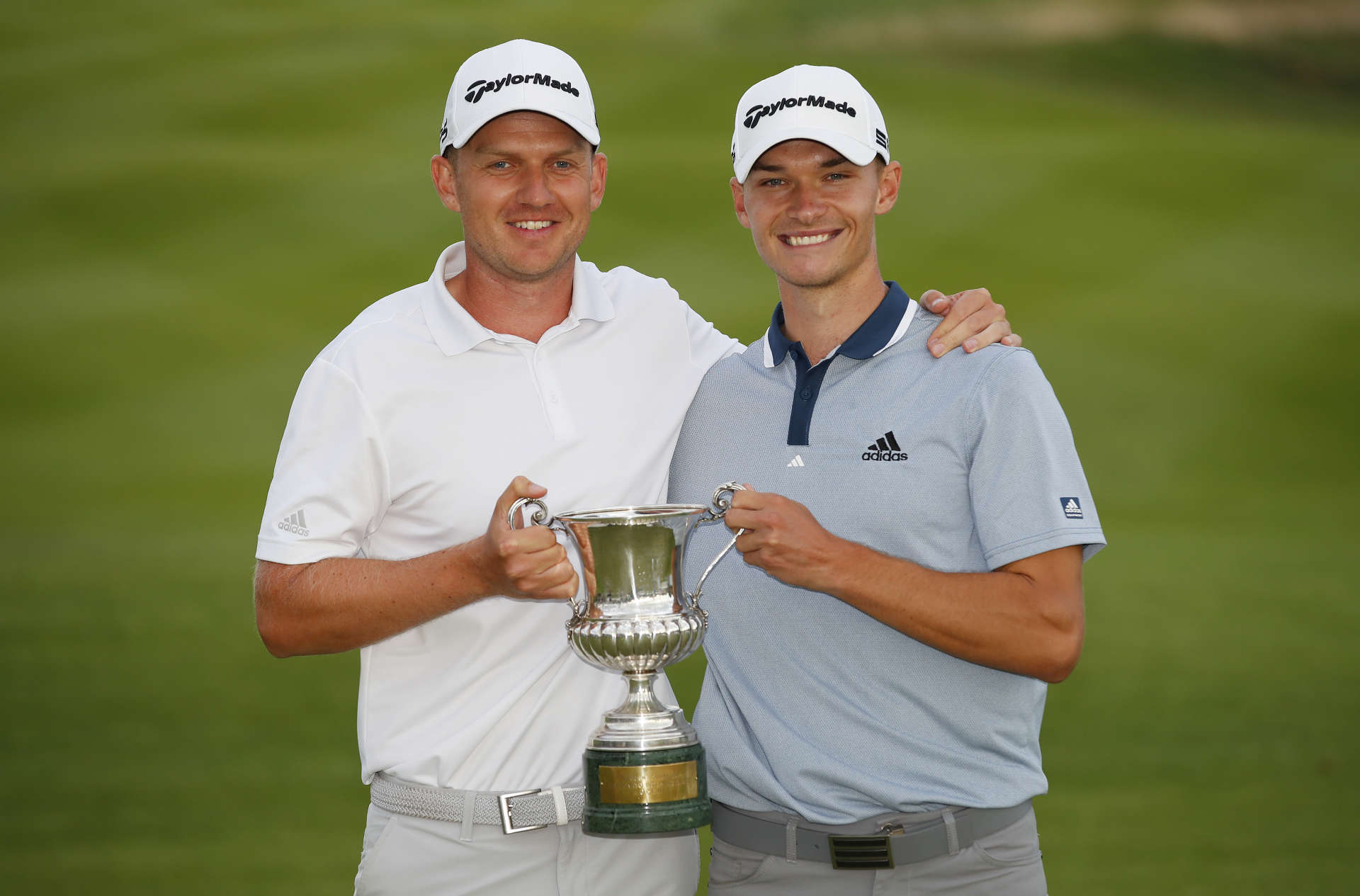 ROME, ITALY - SEPTEMBER 05: Nicolai Hojgaard of Denmark poses for a photo with his caddie Christian Baeck and the trophy during Day Four of The Italian Open at Marco Simone Golf Club on September 05, 2021 in Rome, Italy. (Photo by Luke Walker/Getty Images)