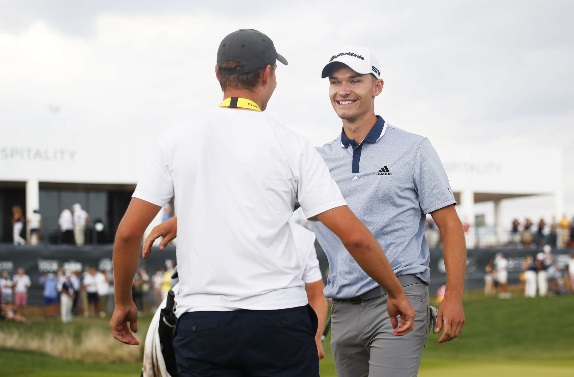 ROME, ITALY - SEPTEMBER 05: Nicolai Hojgaard of Denmark celebrates victory on the 18th hole with his brother Ramus Hojgaard of Denmark during Day Four of The Italian Open at Marco Simone Golf Club on September 05, 2021 in Rome, Italy. (Photo by Luke Walker/Getty Images)