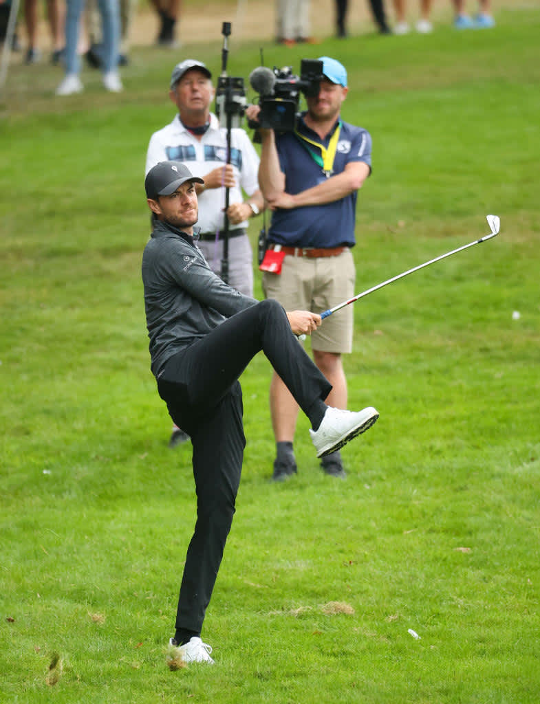 VIRGINIA WATER, ENGLAND - SEPTEMBER 12: Laurie Canter of England hits his second shot on the fourth hole during Day Four of The BMW PGA Championship at Wentworth Golf Club on September 12, 2021 in Virginia Water, England. (Photo by Warren Little/Getty Images)