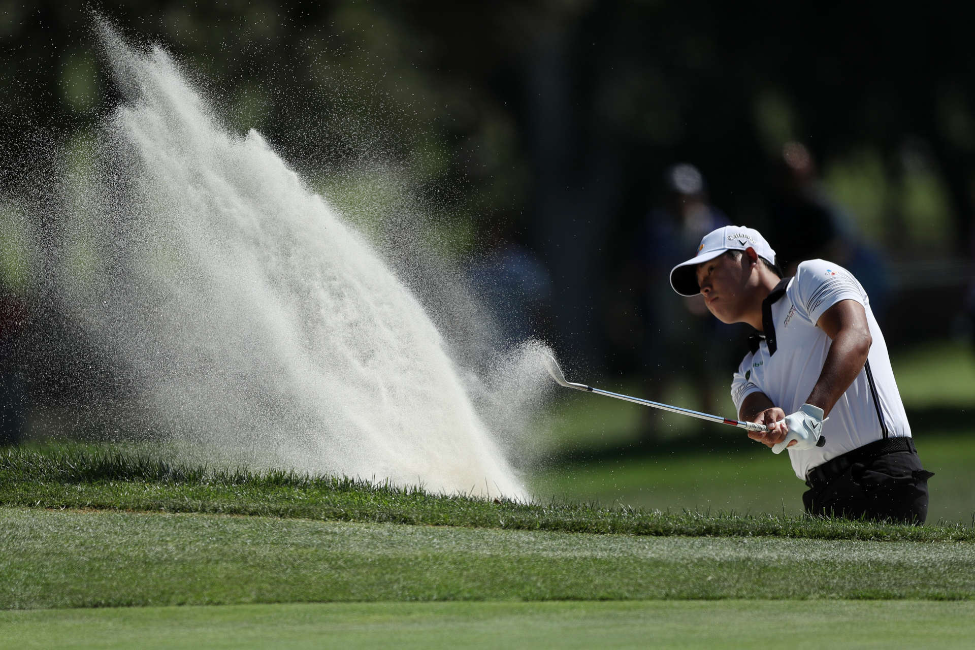 NAPA, CALIFORNIA - SEPTEMBER 17: Si Woo Kim of South Korea hits from the bunker on the third hole during round two of the Fortinet Championship at Silverado Resort and Spa on September 17, 2021 in Napa, California. (Photo by Meg Oliphant/Getty Images)