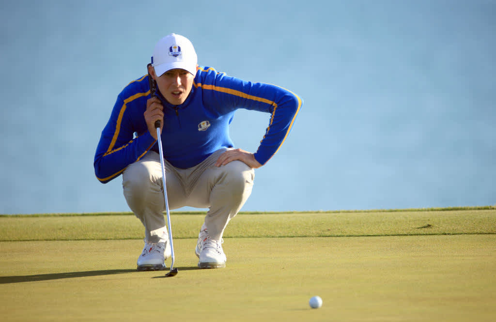 KOHLER, WISCONSIN - SEPTEMBER 24: Matthew Fitzpatrick of England and team Europe lines up a putt during Friday Morning Foursome Matches of the 43rd Ryder Cup at Whistling Straits on September 24, 2021 in Kohler, Wisconsin. (Photo by Mike Ehrmann/Getty Images)