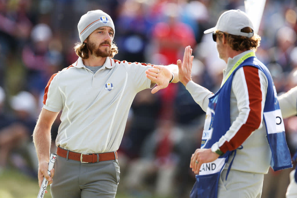 KOHLER, WISCONSIN - SEPTEMBER 25: Tommy Fleetwood of England and team Europe (L) and Viktor Hovland of Norway and team Europe celebrate on the 11th green during Saturday Afternoon Fourball Matches of the 43rd Ryder Cup at Whistling Straits on September 25, 2021 in Kohler, Wisconsin. (Photo by Richard Heathcote/Getty Images)