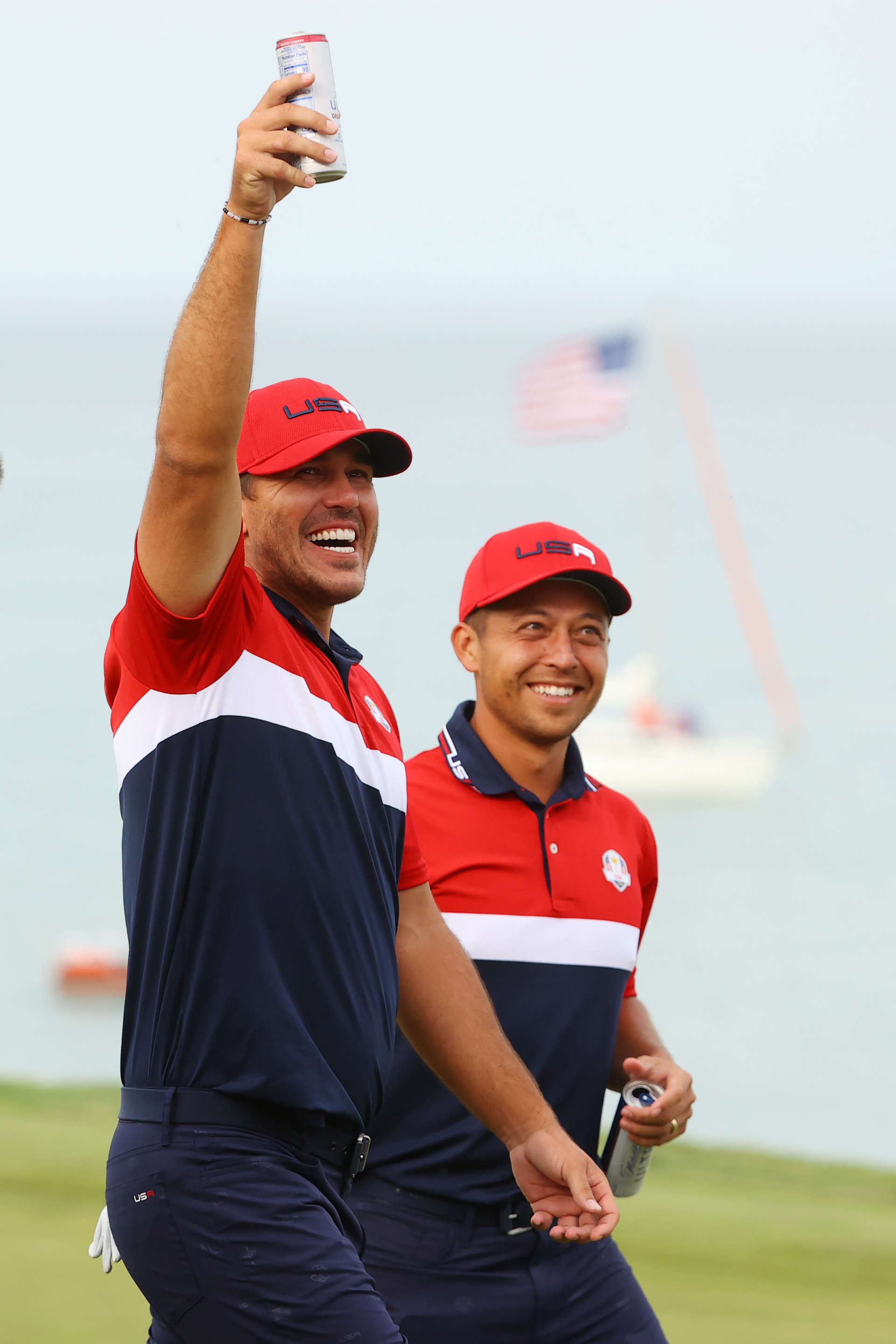 KOHLER, WISCONSIN - SEPTEMBER 26: Brooks Koepka of team United States and Xander Schauffele of team United States celebrate their win over Team Europe during Sunday Singles Matches of the 43rd Ryder Cup at Whistling Straits on September 26, 2021 in Kohler, Wisconsin. (Photo by Andrew Redington/Getty Images)