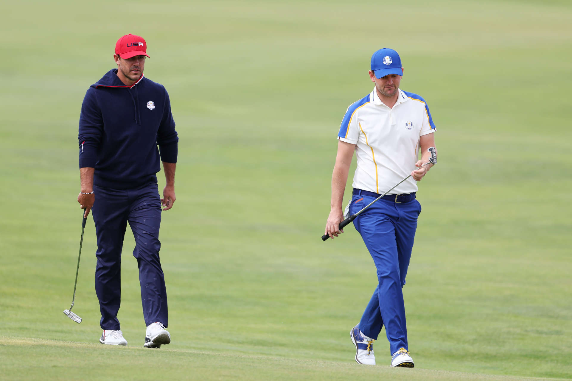 KOHLER, WISCONSIN - SEPTEMBER 26: Bernd Wiesberger of Austria and team Europe and Brooks Koepka of team United States walk on the first hole during Sunday Singles Matches of the 43rd Ryder Cup at Whistling Straits on September 26, 2021 in Kohler, Wisconsin. (Photo by Richard Heathcote/Getty Images)