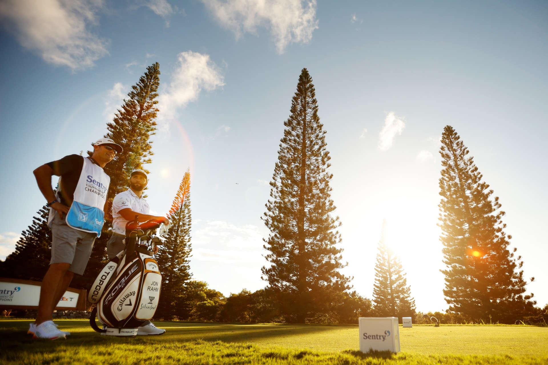 LAHAINA, HAWAII - JANUARY 08: Jon Rahm of Spain and caddie Adam Hayes stand on the 18th tee during the third round of the Sentry Tournament of Champions at the Plantation Course at Kapalua Golf Club on January 08, 2022 in Lahaina, Hawaii. (Photo by Cliff Hawkins/Getty Images)