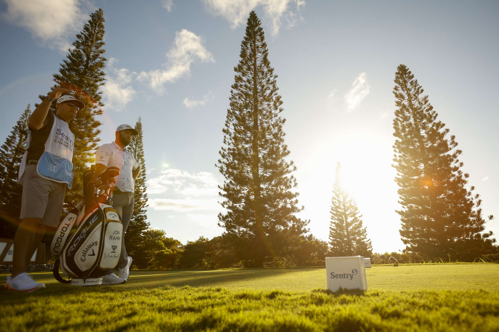 LAHAINA, HAWAII - JANUARY 08: Jon Rahm of Spain and caddie Adam Hayes talk on the 18th tee during the third round of the Sentry Tournament of Champions at the Plantation Course at Kapalua Golf Club on January 08, 2022 in Lahaina, Hawaii. (Photo by Cliff Hawkins/Getty Images)