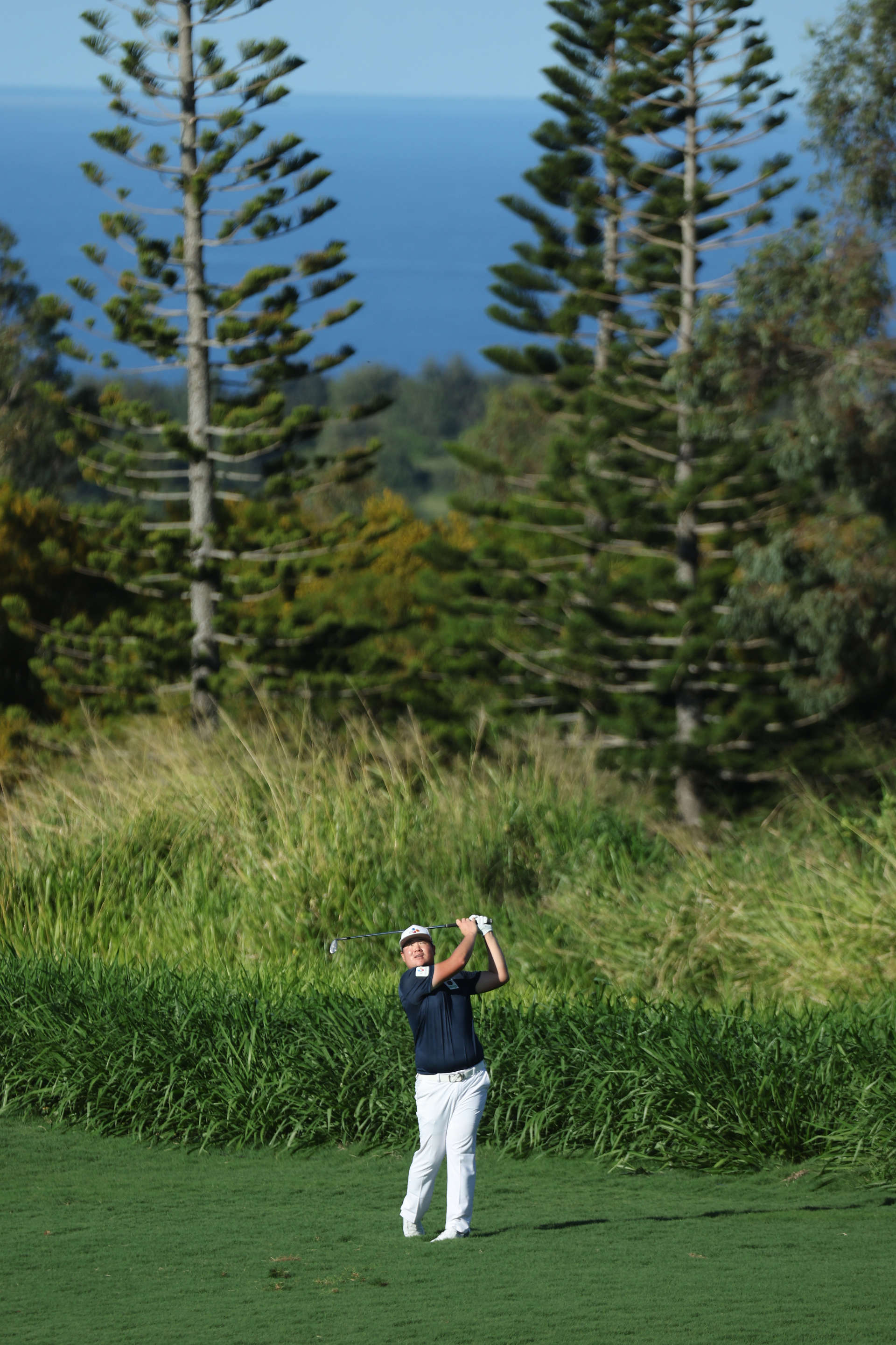 LAHAINA, HAWAII - JANUARY 08: Sungjae Im of Korea plays an approach shot during the third round of the Sentry Tournament of Champions at the Plantation Course at Kapalua Golf Club on January 08, 2022 in Lahaina, Hawaii. (Photo by Gregory Shamus/Getty Images)