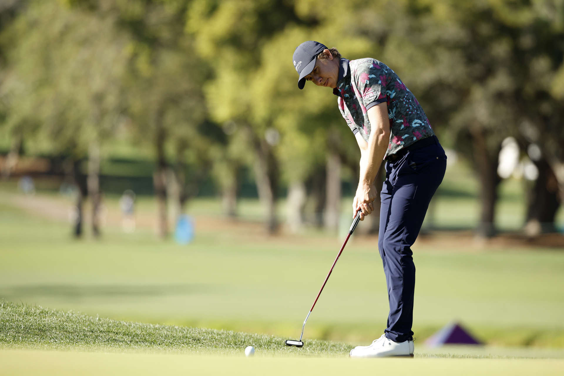 PALM HARBOR, FLORIDA - MARCH 17: Carlos Ortiz of Mexico putts on the 16th green during the first round of the Valspar Championship on the Copperhead Course at Innisbrook Resort and Golf Club on March 17, 2022 in Palm Harbor, Florida. (Photo by Cliff Hawkins/Getty Images)