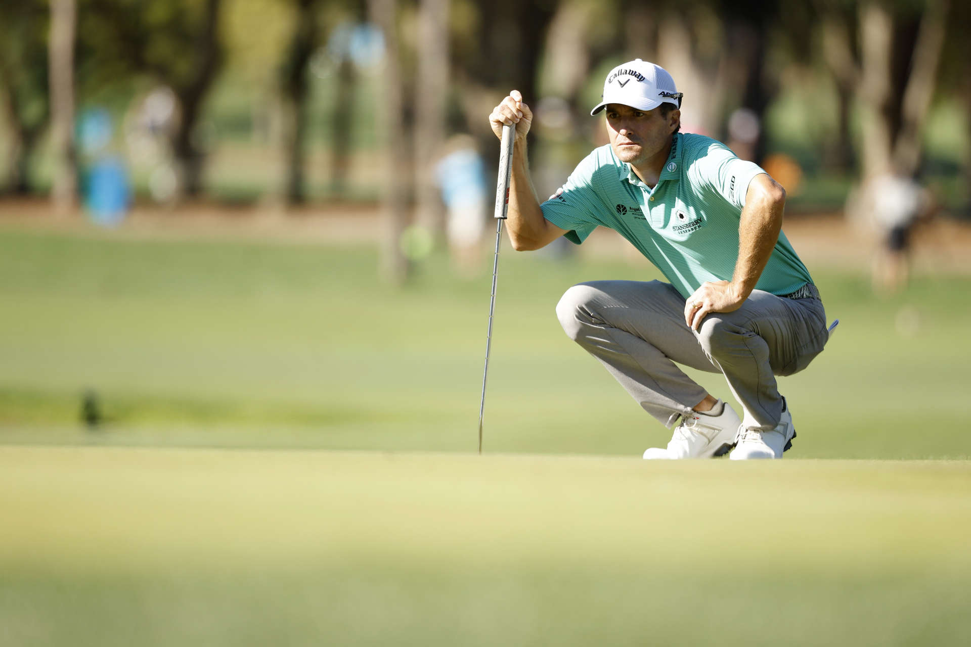 PALM HARBOR, FLORIDA - MARCH 17: Kevin Kisner of the United States lines up his putt on the 16th green during the first round of the Valspar Championship on the Copperhead Course at Innisbrook Resort and Golf Club on March 17, 2022 in Palm Harbor, Florida. (Photo by Cliff Hawkins/Getty Images)