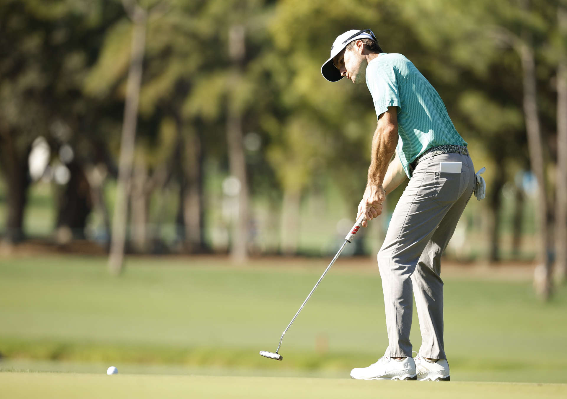 PALM HARBOR, FLORIDA - MARCH 17: Kevin Kisner of the United States putts on the 16th green during the first round of the Valspar Championship on the Copperhead Course at Innisbrook Resort and Golf Club on March 17, 2022 in Palm Harbor, Florida. (Photo by Cliff Hawkins/Getty Images)