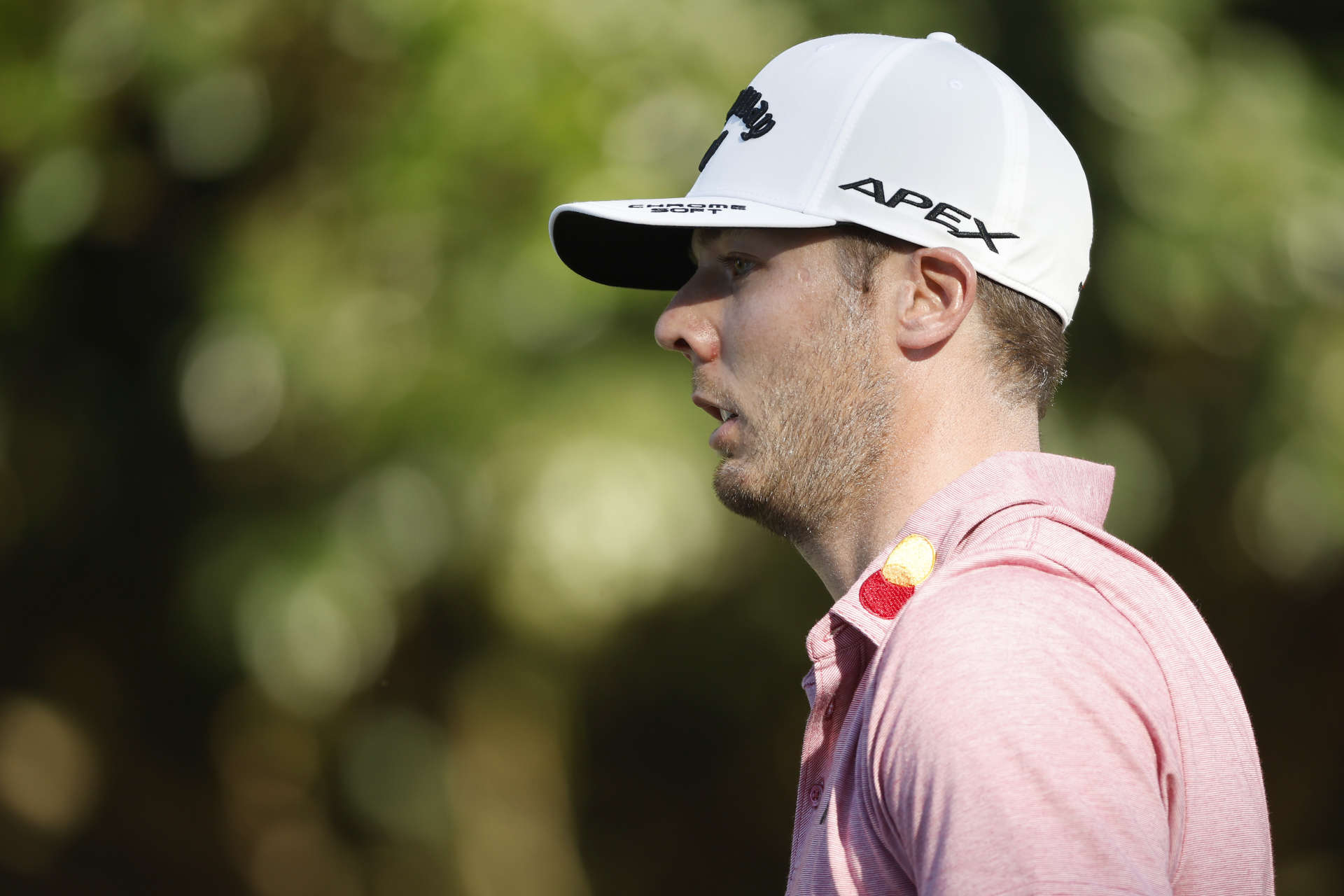 PALM HARBOR, FLORIDA - MARCH 17: Sam Burns of the United States looks on as he walks off the 17th tee during the first round of the Valspar Championship on the Copperhead Course at Innisbrook Resort and Golf Club on March 17, 2022 in Palm Harbor, Florida. (Photo by Cliff Hawkins/Getty Images)