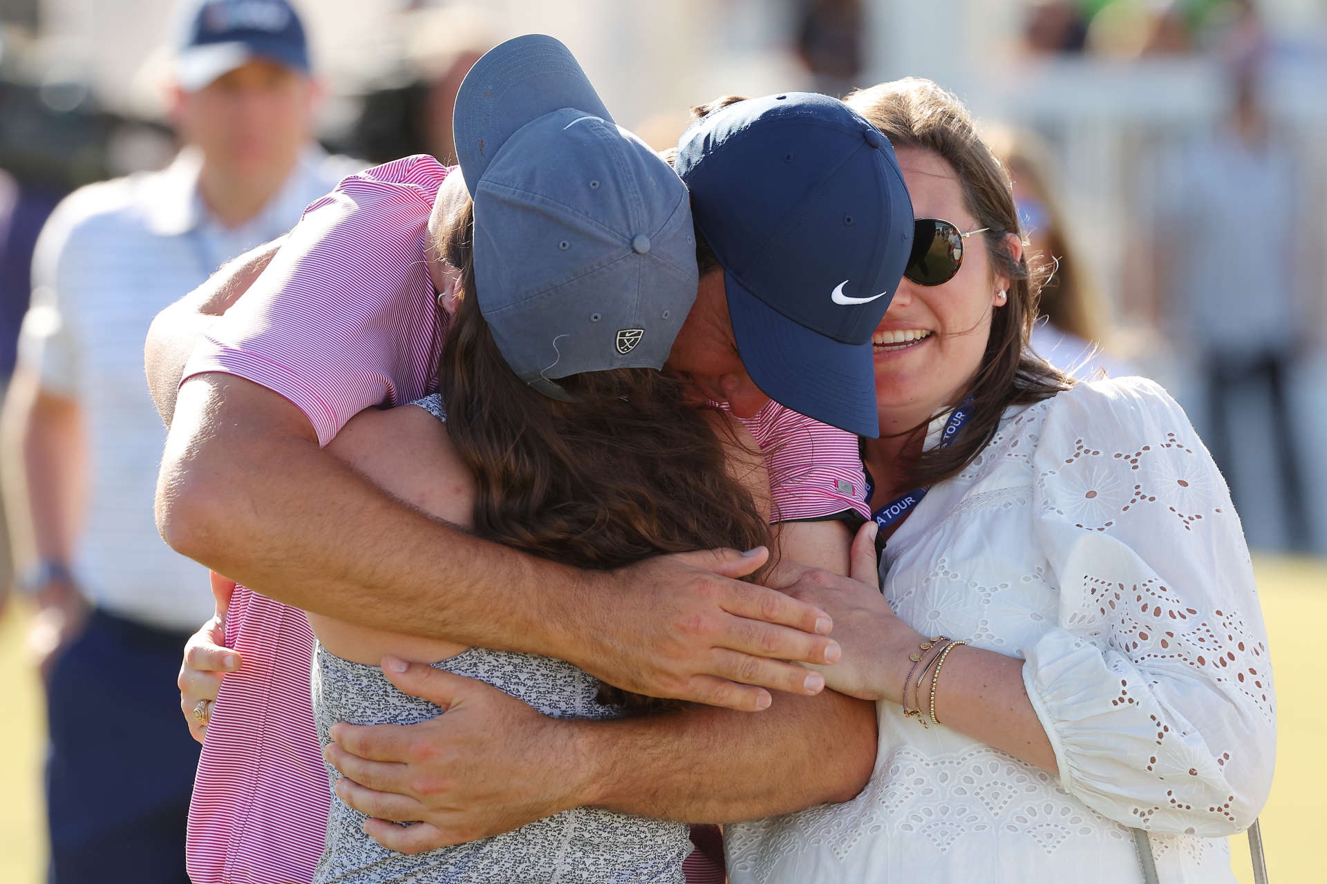 AUSTIN, TEXAS - MARCH 27: Scottie Scheffler of the United States hugs his famil after defeating Kevin Kisner of the United States 4&3 in their finals match to win the World Golf Championships-Dell Technologies Match Play at Austin Country Club on March 27, 2022 in Austin, Texas. (Photo by Kevin C. Cox/Getty Images)