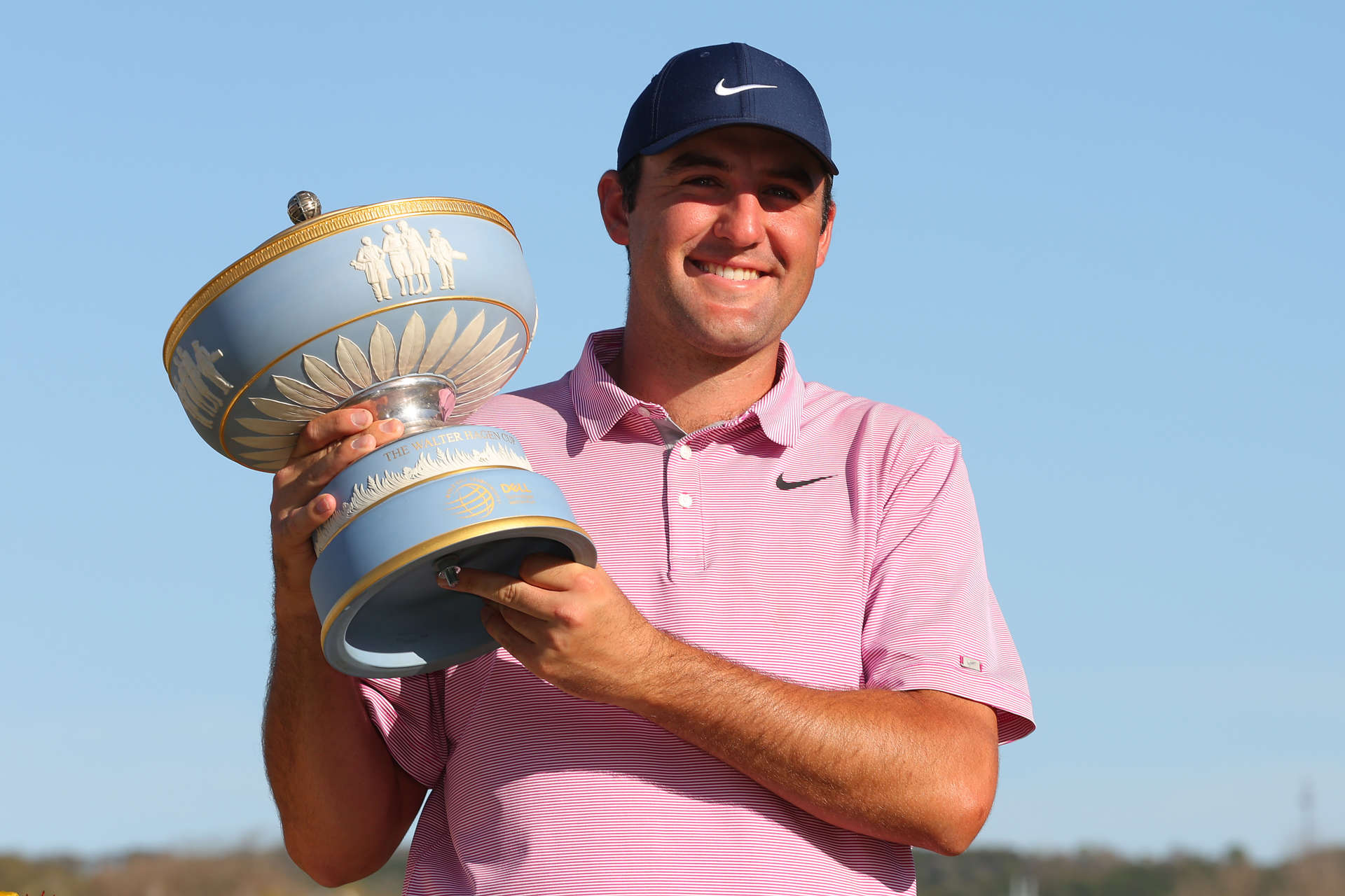 AUSTIN, TEXAS - MARCH 27: Scottie Scheffler of the United States poses with the Walter Hagen Cup after defeating Kevin Kisner of the United States 4&3 in their finals match to win the World Golf Championships-Dell Technologies Match Play at Austin Country Club on March 27, 2022 in Austin, Texas. (Photo by Kevin C. Cox/Getty Images)