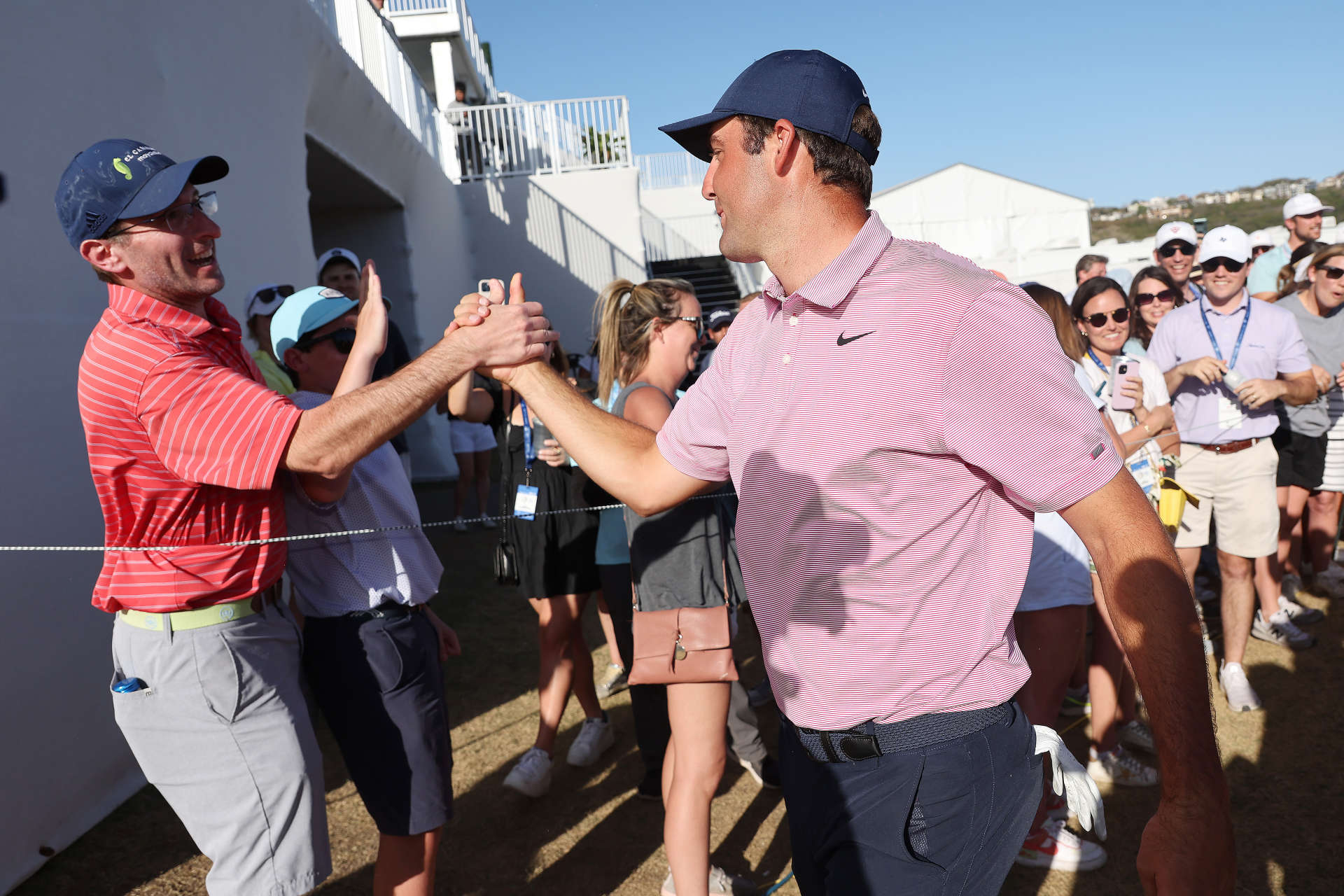 AUSTIN, TEXAS - MARCH 27: Scottie Scheffler of the United States celebrates after defeating Kevin Kisner of the United States 4&3 in their finals match to win the World Golf Championships-Dell Technologies Match Play at Austin Country Club on March 27, 2022 in Austin, Texas. (Photo by Gregory Shamus/Getty Images)