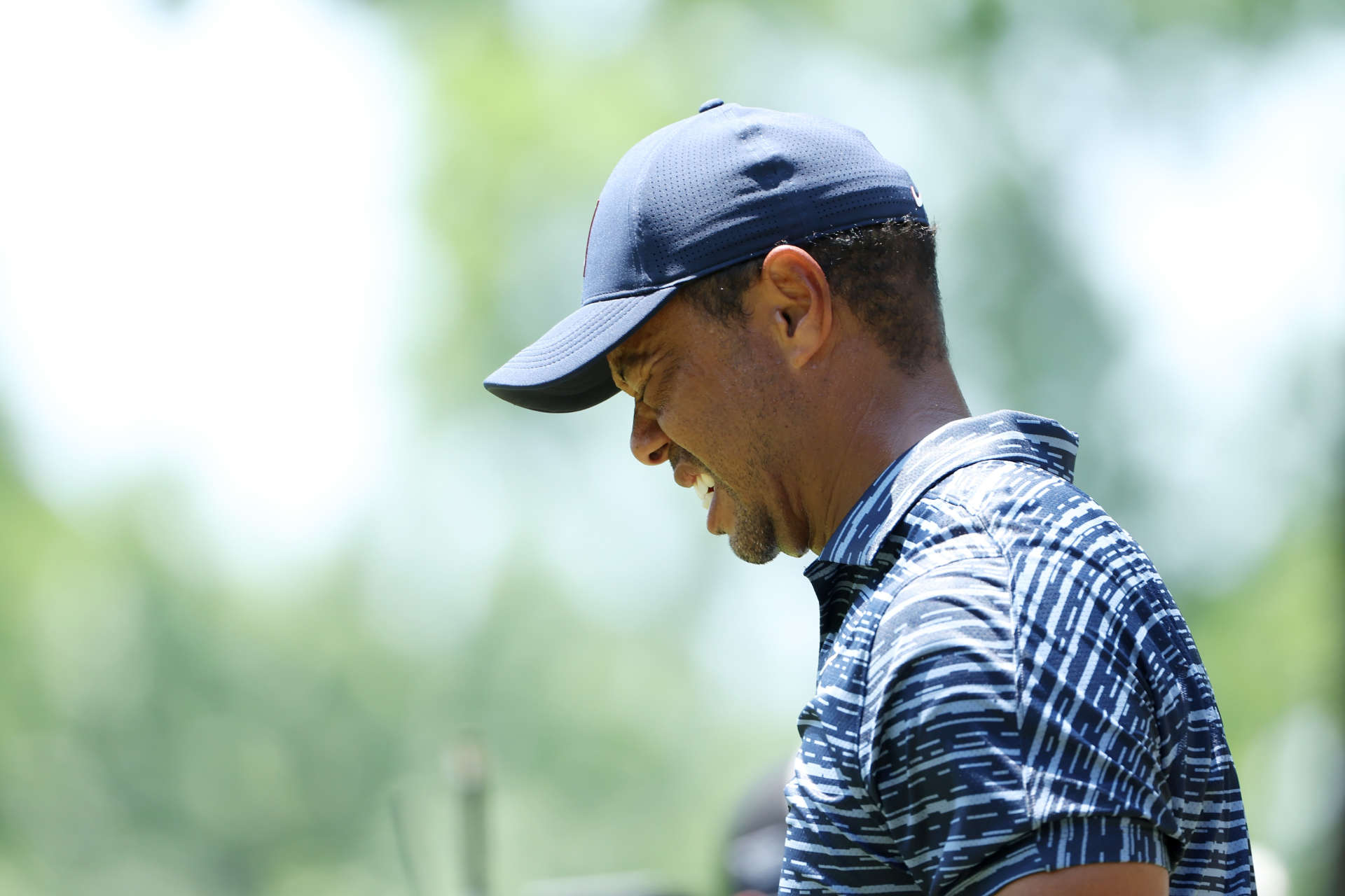 TULSA, OKLAHOMA - MAY 19: Tiger Woods of the United States reacts after his tee shot on the eighth hole during the first round of the 2022 PGA Championship at Southern Hills Country Club on May 19, 2022 in Tulsa, Oklahoma. (Photo by Christian Petersen/Getty Images)