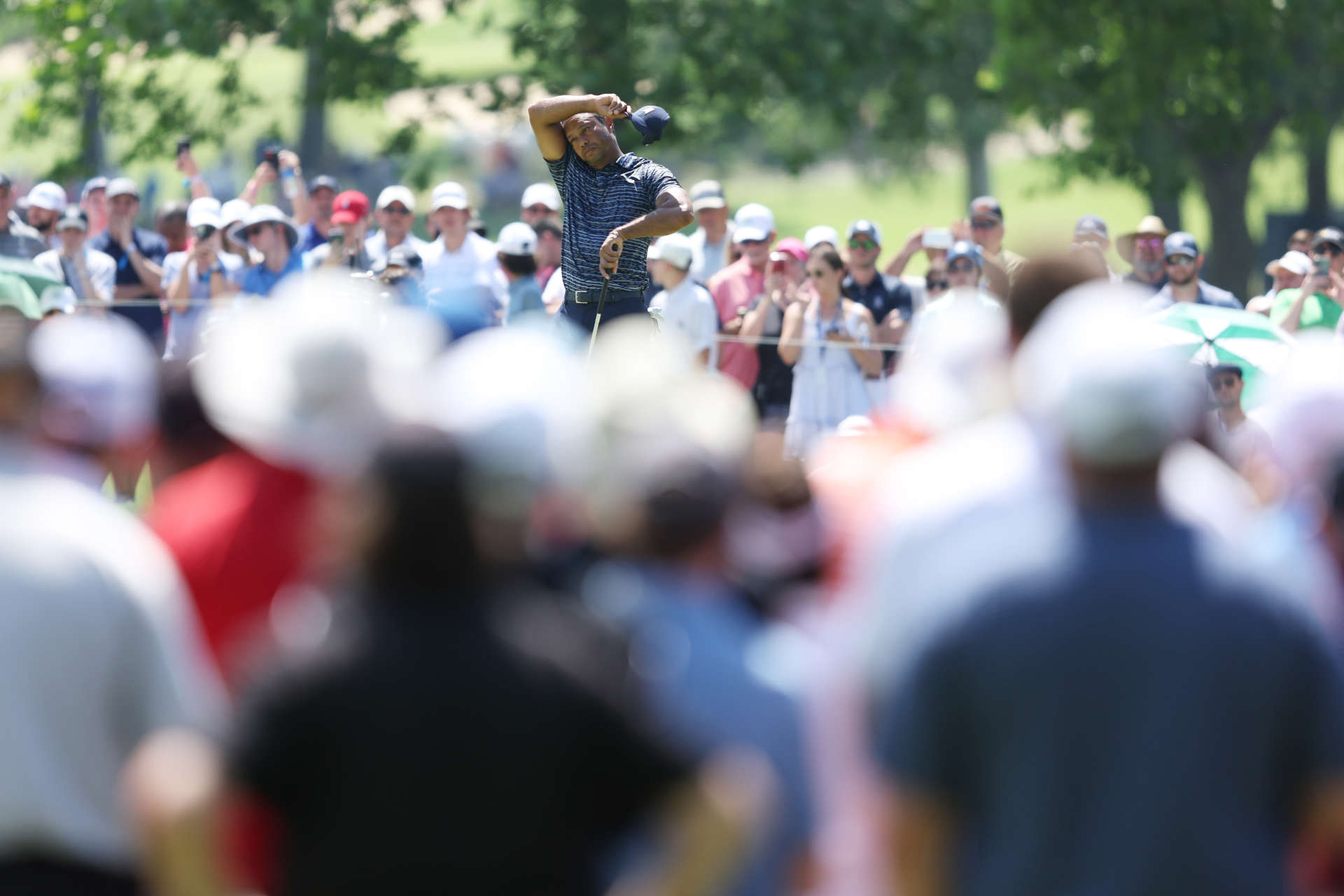 TULSA, OKLAHOMA - MAY 19: Tiger Woods of the United States reacts to his tee shot on the second hole during the first round of the 2022 PGA Championship at Southern Hills Country Club on May 19, 2022 in Tulsa, Oklahoma. (Photo by Richard Heathcote/Getty Images)