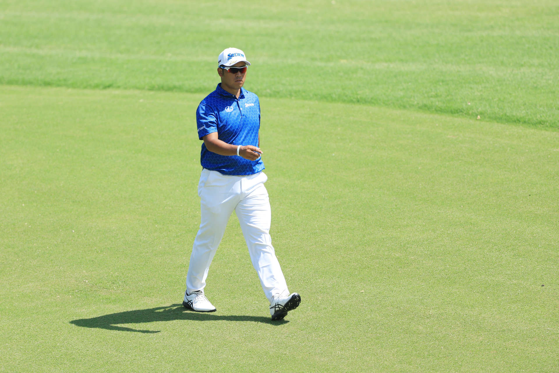 TULSA, OKLAHOMA - MAY 19: Hideki Matsuyama of Japan walks up the fourth fairway during the first round of the 2022 PGA Championship at Southern Hills Country Club on May 19, 2022 in Tulsa, Oklahoma. (Photo by Sam Greenwood/Getty Images)