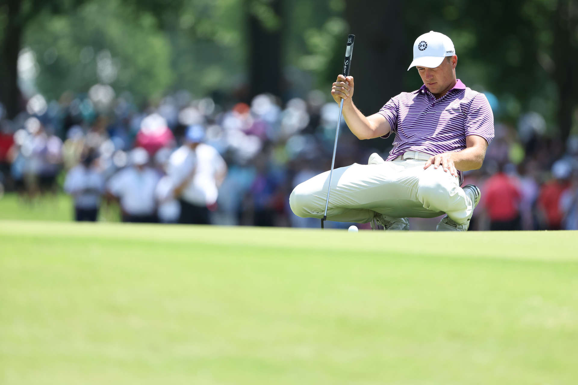 TULSA, OKLAHOMA - MAY 19: Jordan Spieth of the United States lines up a putt on the sixth green during the first round of the 2022 PGA Championship at Southern Hills Country Club on May 19, 2022 in Tulsa, Oklahoma. (Photo by Christian Petersen/Getty Images)