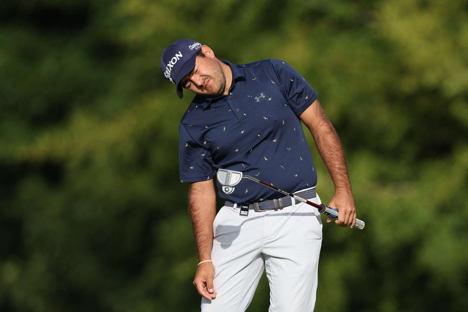 South African golfer Hennie du Plessis reacts as he chips onto the 15th green on the third and final day of the LIV Golf Invitational Series event at The Centurion Club in St Albans, north of London, on June 11, 2022. - The LIV Golf Invitational London, the launch event of a lucrative and divisive series that is rocking the sport reaches it's conclusion. The $25 million event in St Albans -- the biggest prize pot in history -- is the first of eight tournaments this year bankrolled by Saudi Arabia's sovereign wealth fund, worth a combined $255 million. (Photo by Adrian DENNIS / AFP) (Photo by ADRIAN DENNIS/AFP via Getty Images)