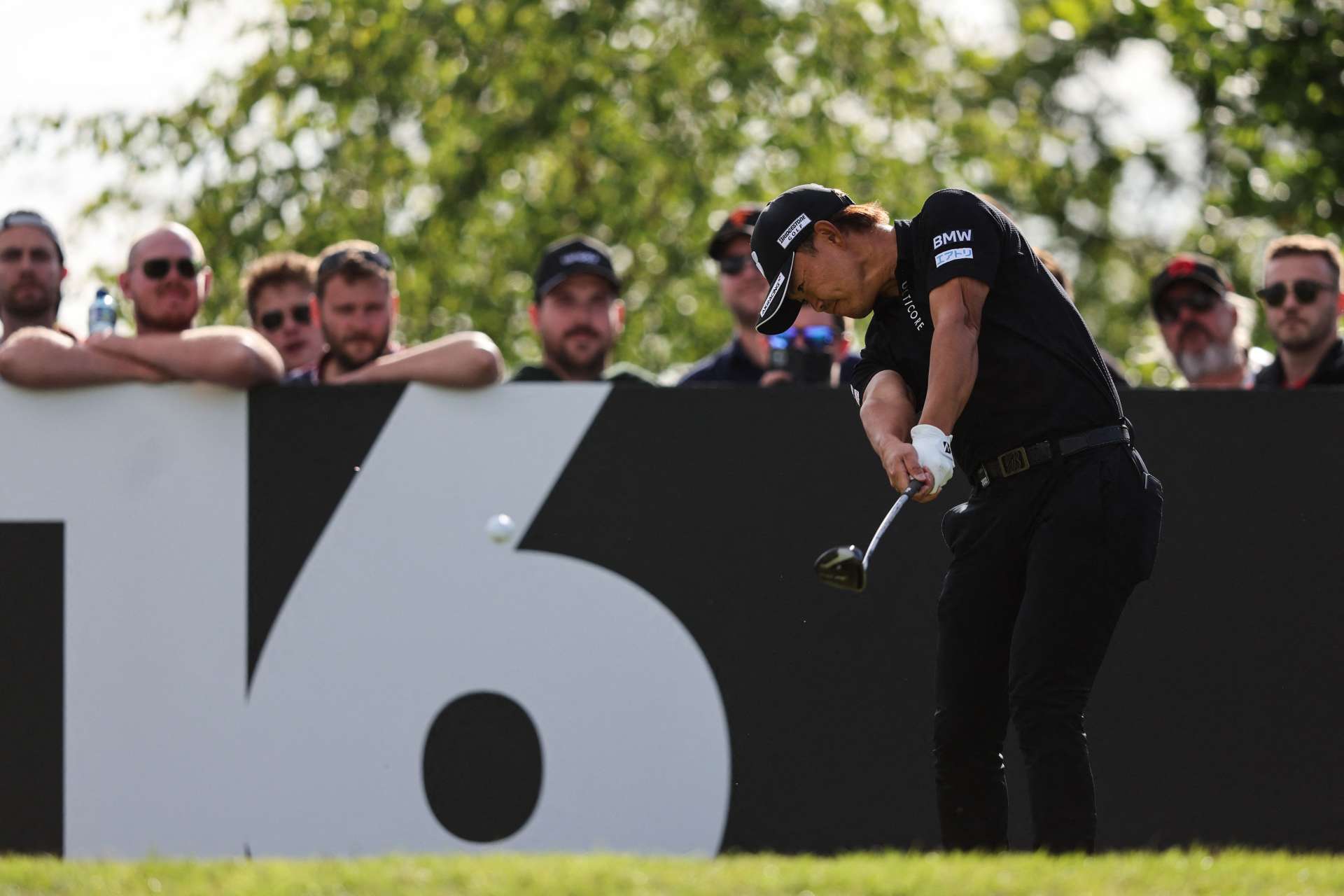 Japanese golfer Ryosuke Kinoshita plays a shot on the 16th hole on the third and final day of the LIV Golf Invitational Series event at The Centurion Club in St Albans, north of London, on June 11, 2022. - The LIV Golf Invitational London, the launch event of a lucrative and divisive series that is rocking the sport reaches it's conclusion. The $25 million event in St Albans -- the biggest prize pot in history -- is the first of eight tournaments this year bankrolled by Saudi Arabia's sovereign wealth fund, worth a combined $255 million. (Photo by Adrian DENNIS / AFP) (Photo by ADRIAN DENNIS/AFP via Getty Images)