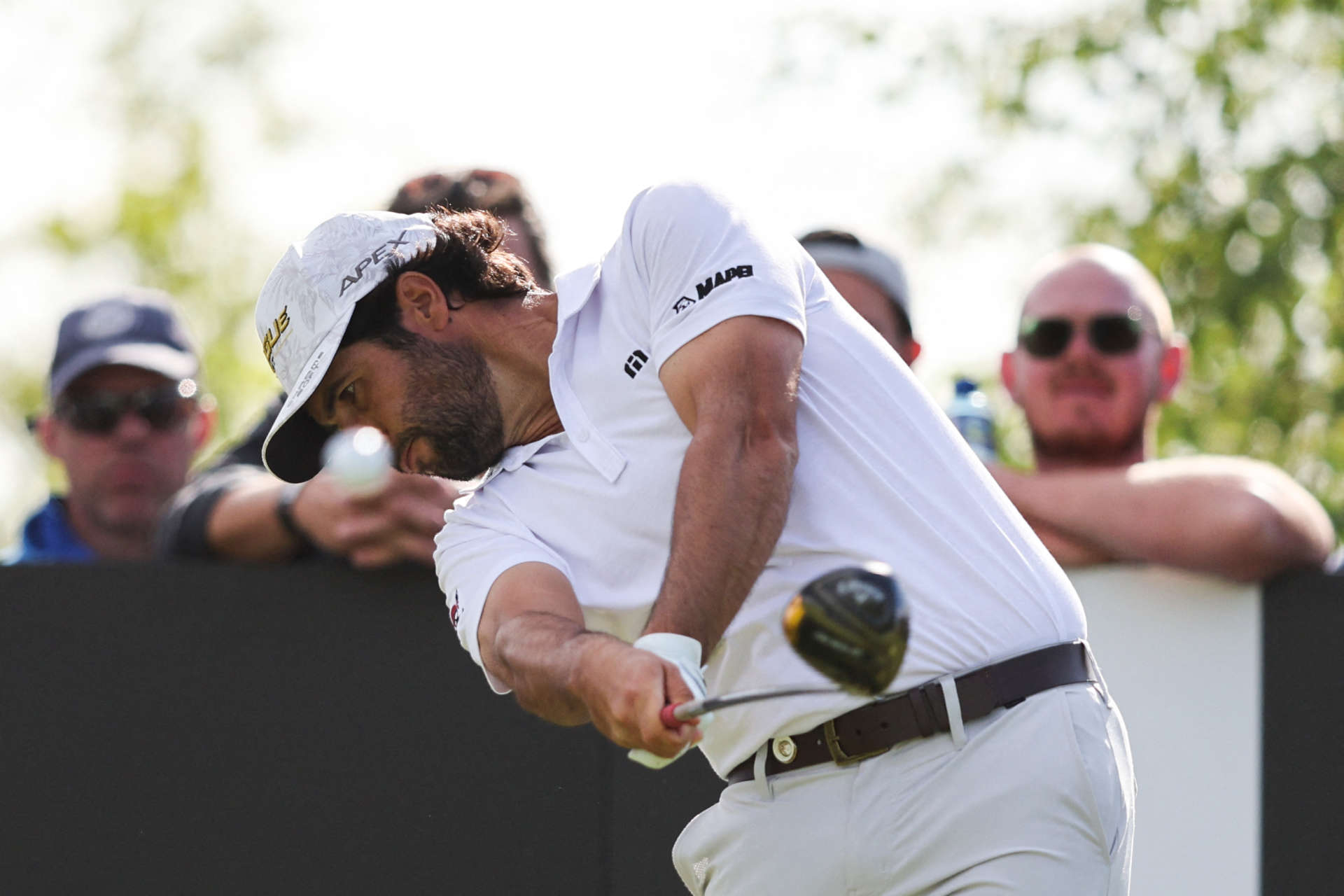Spanish golfer Adrian Otaegui plays a shot on the 16th hole on the third and final day of the LIV Golf Invitational Series event at The Centurion Club in St Albans, north of London, on June 11, 2022. - The LIV Golf Invitational London, the launch event of a lucrative and divisive series that is rocking the sport reaches it's conclusion. The $25 million event in St Albans -- the biggest prize pot in history -- is the first of eight tournaments this year bankrolled by Saudi Arabia's sovereign wealth fund, worth a combined $255 million. (Photo by Adrian DENNIS / AFP) (Photo by ADRIAN DENNIS/AFP via Getty Images)