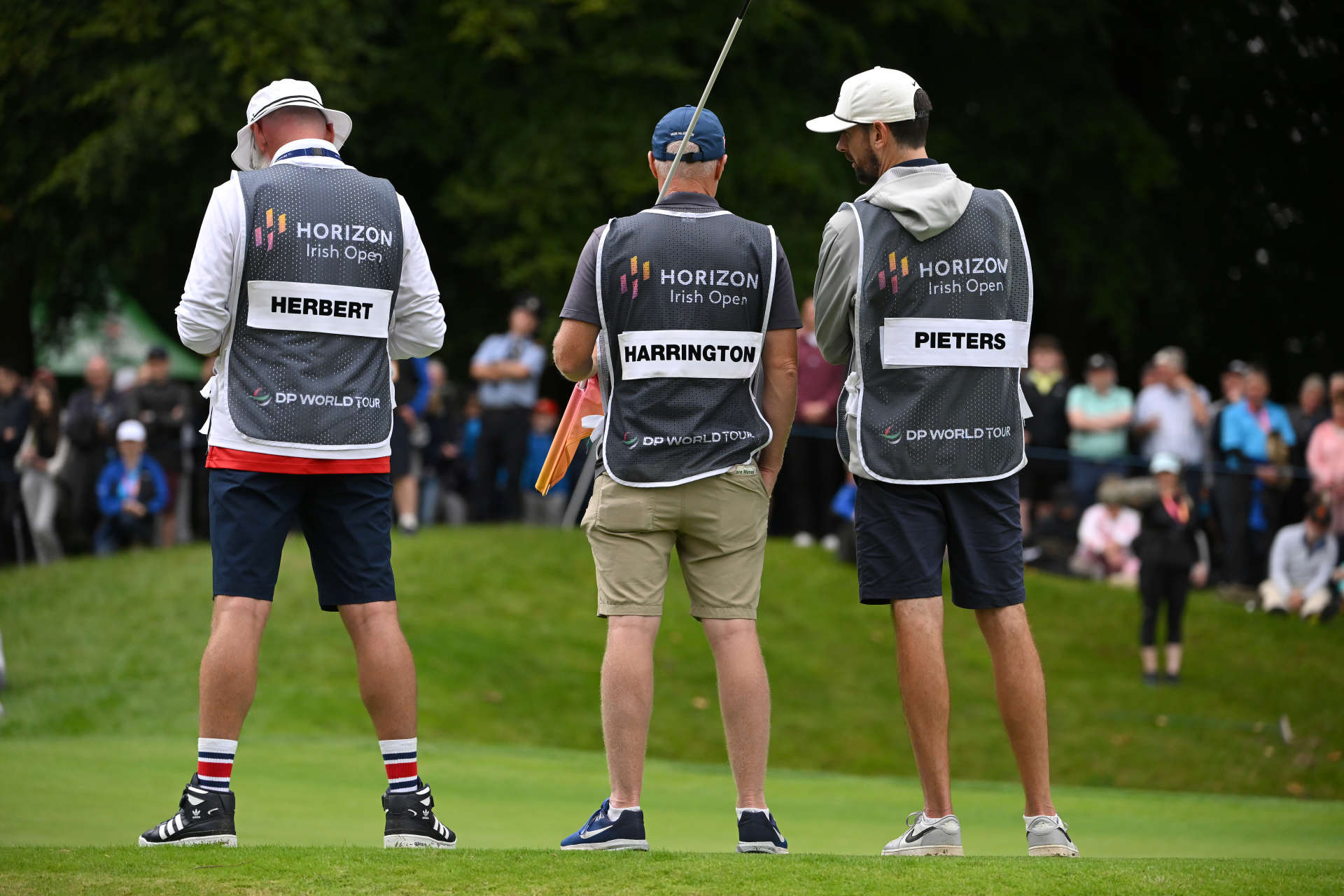 THOMASTOWN, IRELAND - JUNE 30: Caddies are pictured on the 14th green during the first round of the Horizon Irish Open at Mount Juliet Estate on June 30, 2022 in Thomastown, Ireland. (Photo by Ross Kinnaird/Getty Images)