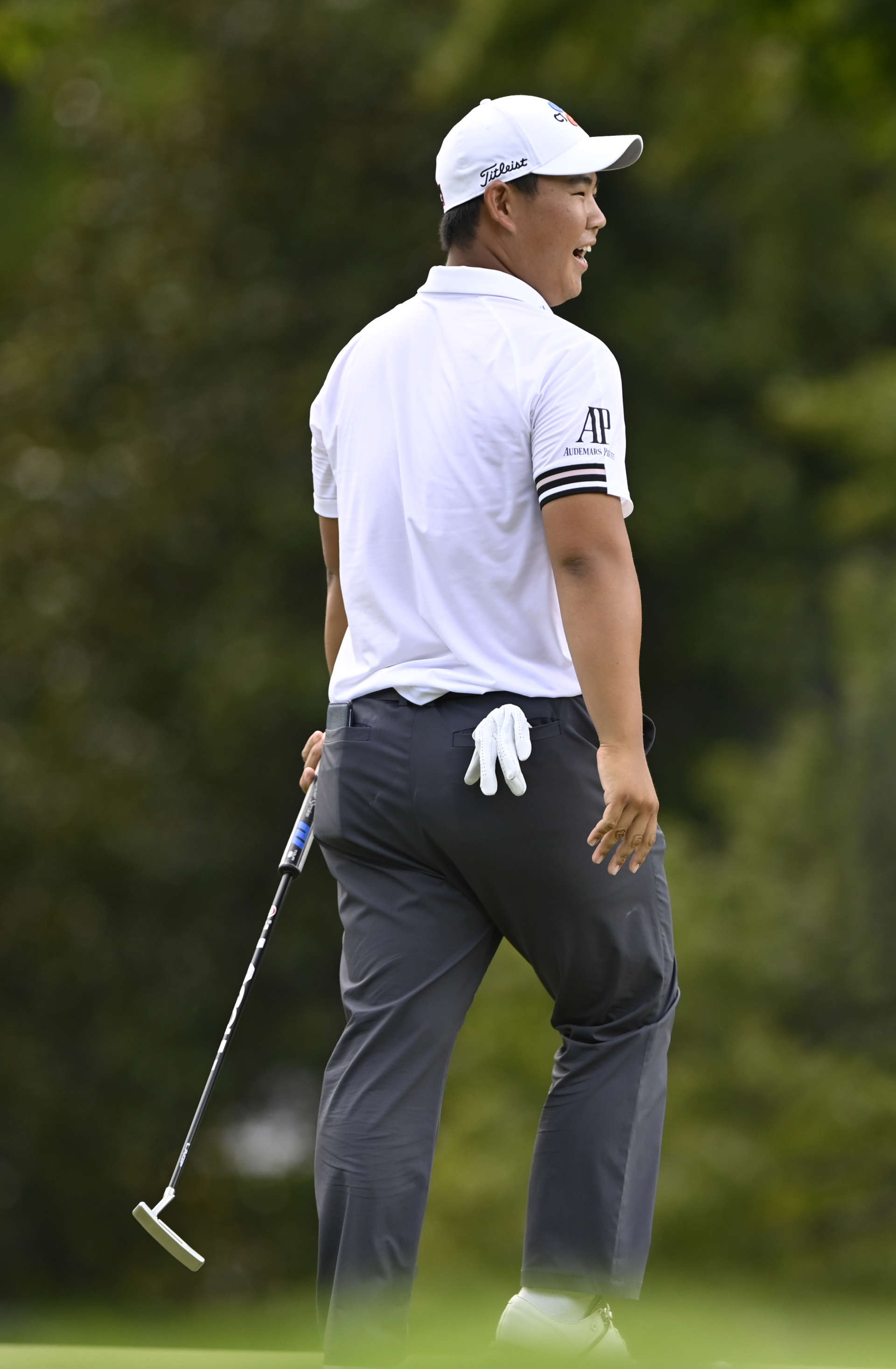 GREENSBORO, NORTH CAROLINA - AUGUST 07: Joohyung Kim of Korea reacts to his putt on the 14th green during the final round of the Wyndham Championship at Sedgefield Country Club on August 07, 2022 in Greensboro, North Carolina. (Photo by Eakin Howard/Getty Images)