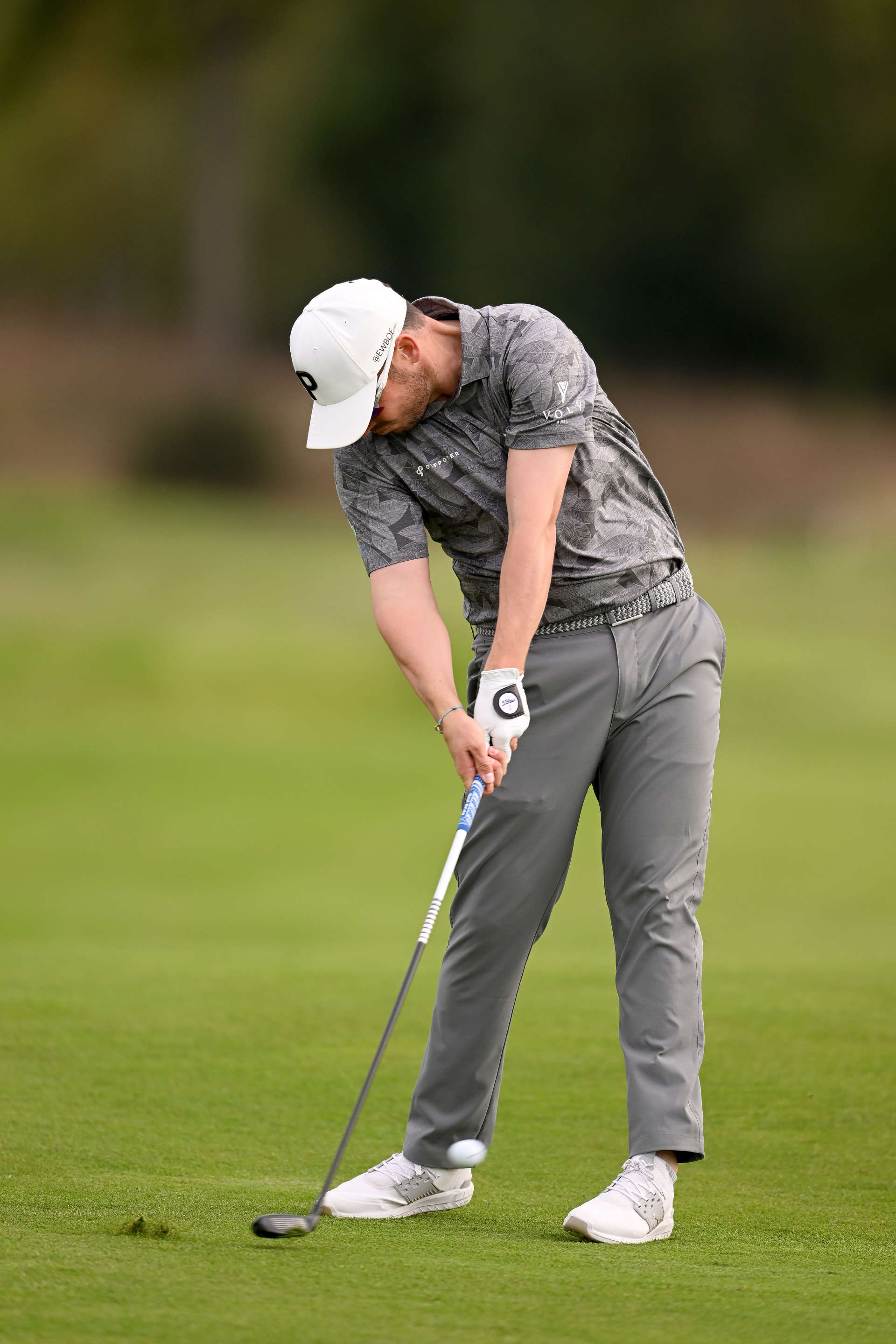 PARIS, FRANCE - SEPTEMBER 23: Ewen Ferguson of Scotland plays his second shot on the 14th hole on Day Two of the Cazoo Open de France at Le Golf National on September 23, 2022 in Paris, France. (Photo by Ross Kinnaird/Getty Images)