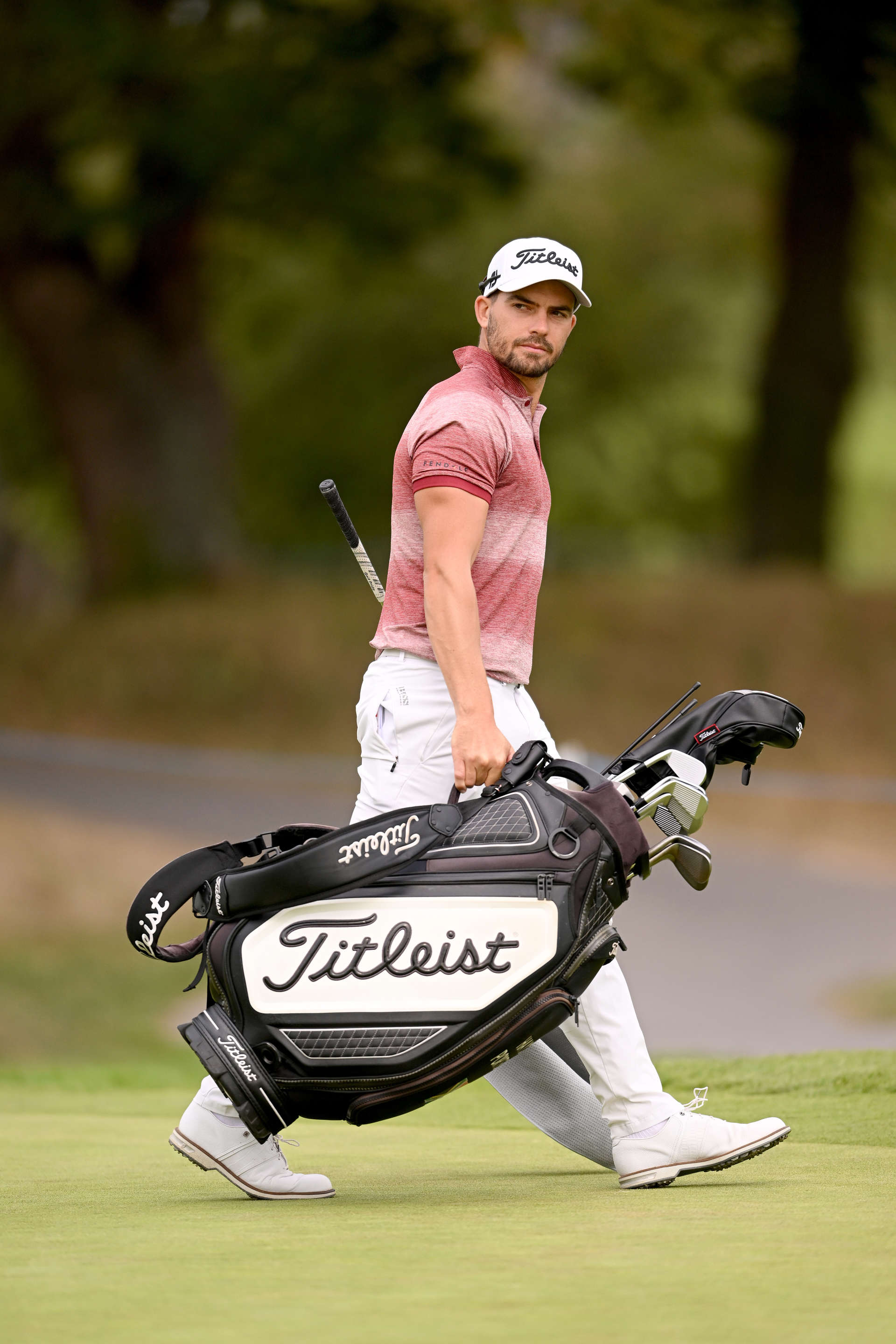 PARIS, FRANCE - SEPTEMBER 23: Haydn Porteous of South Africa plays moves his bag at the 3rd hole on Day Two of the Cazoo Open de France at Le Golf National on September 23, 2022 in Paris, France. (Photo by Ross Kinnaird/Getty Images)