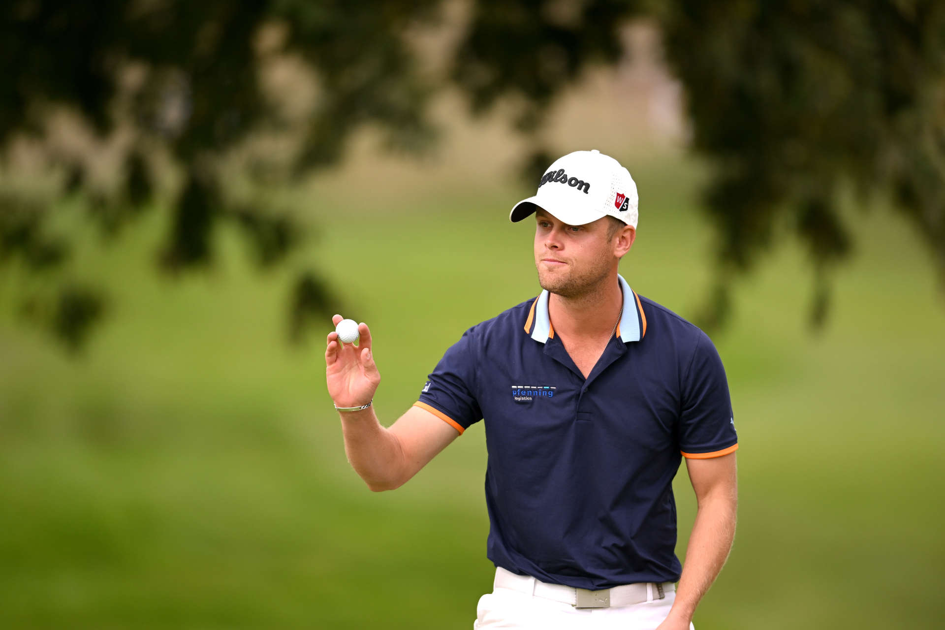 PARIS, FRANCE - SEPTEMBER 23: Hurly Long of Germany acknowledges the fans on the 3rd hole on Day Two of the Cazoo Open de France at Le Golf National on September 23, 2022 in Paris, France. (Photo by Ross Kinnaird/Getty Images)