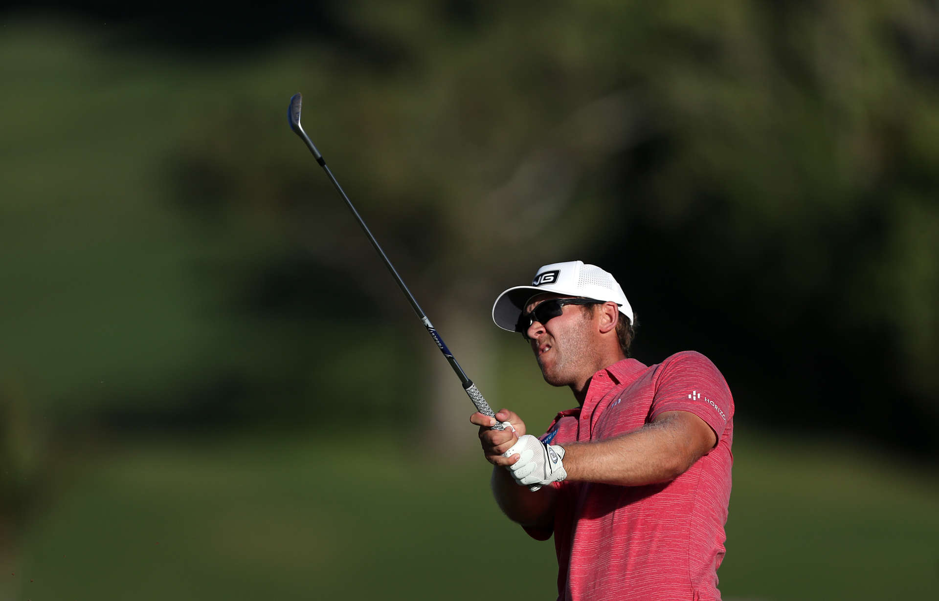 SOUTHAMPTON, BERMUDA - OCTOBER 30: Seamus Power of Ireland hits his second shot on the 15th hole during the final round of the Butterfield Bermuda Championship at Port Royal Golf Course on October 30, 2022 in Southampton, . (Photo by Courtney Culbreath/Getty Images)