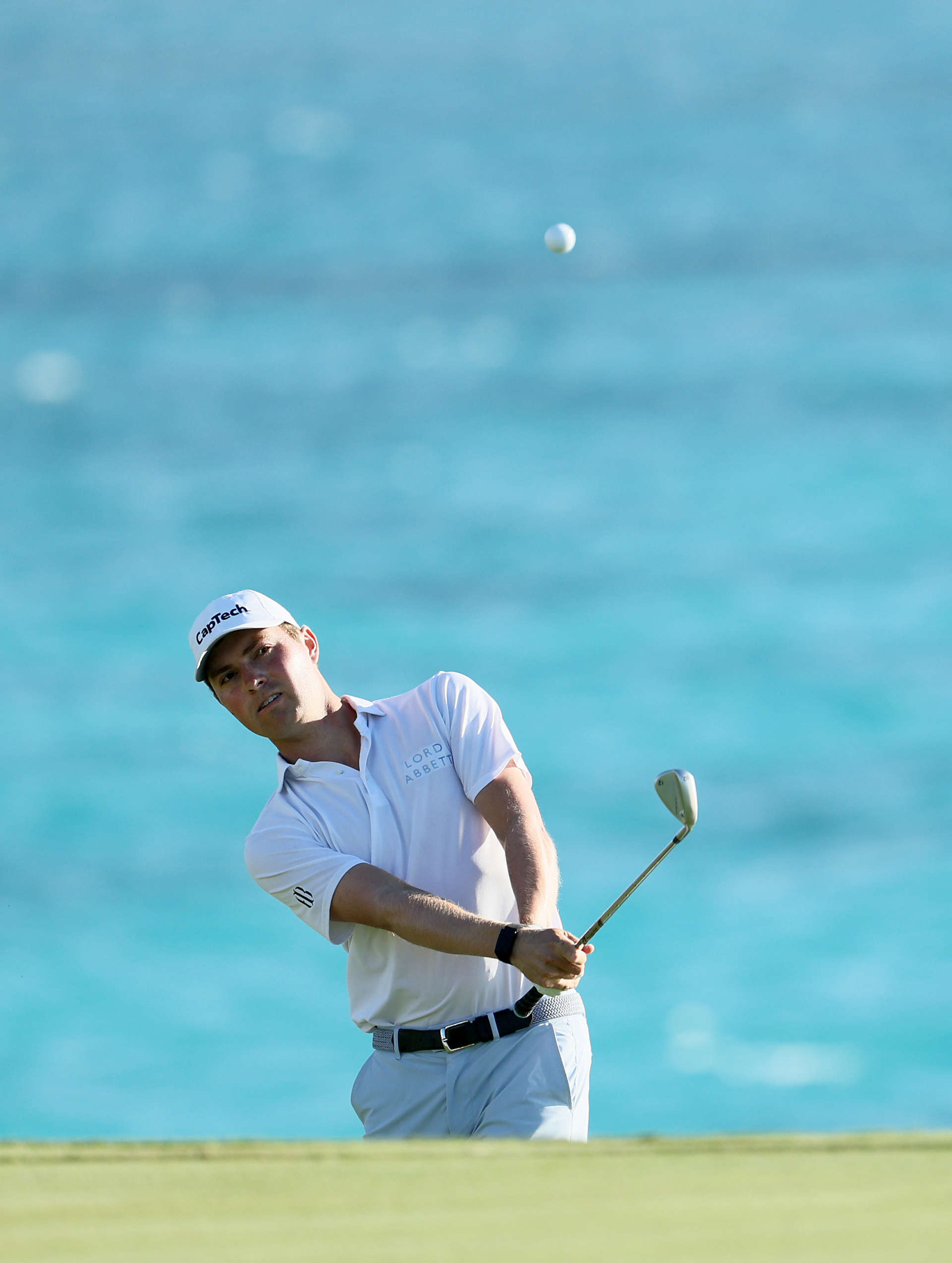 SOUTHAMPTON, BERMUDA - OCTOBER 30: Ben Griffin hits his second shot on the 16th hole during the fourth round of the Butterfield Bermuda Championship at Port Royal Golf Course on October 30, 2022 in Southampton, . (Photo by Andy Lyons/Getty Images)