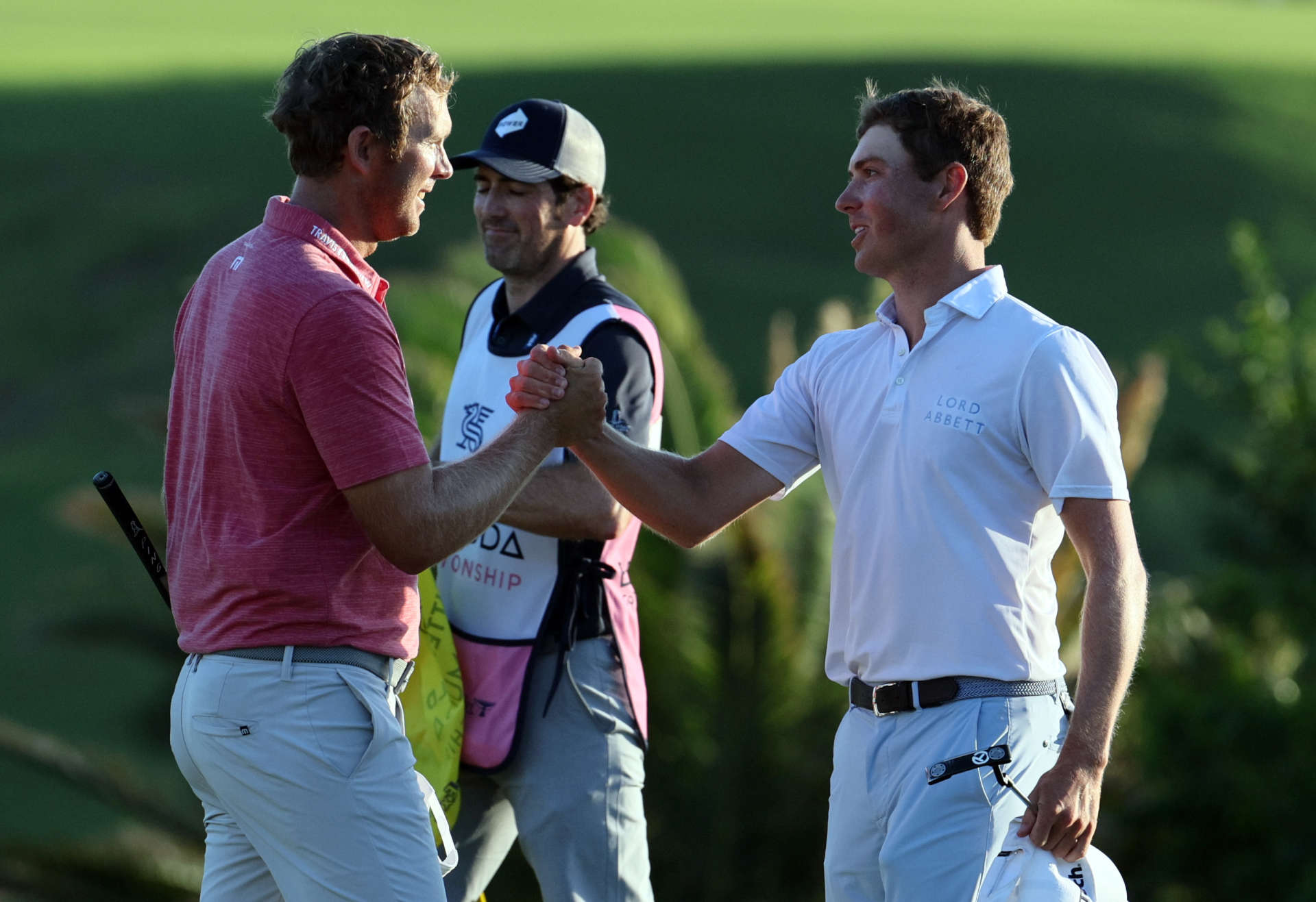 SOUTHAMPTON, BERMUDA - OCTOBER 30: Seamus Power of Ireland is congratulated by Ben Griffin after winning the Butterfield Bermuda Championship at Port Royal Golf Course on October 30, 2022 in Southampton, . (Photo by Andy Lyons/Getty Images)