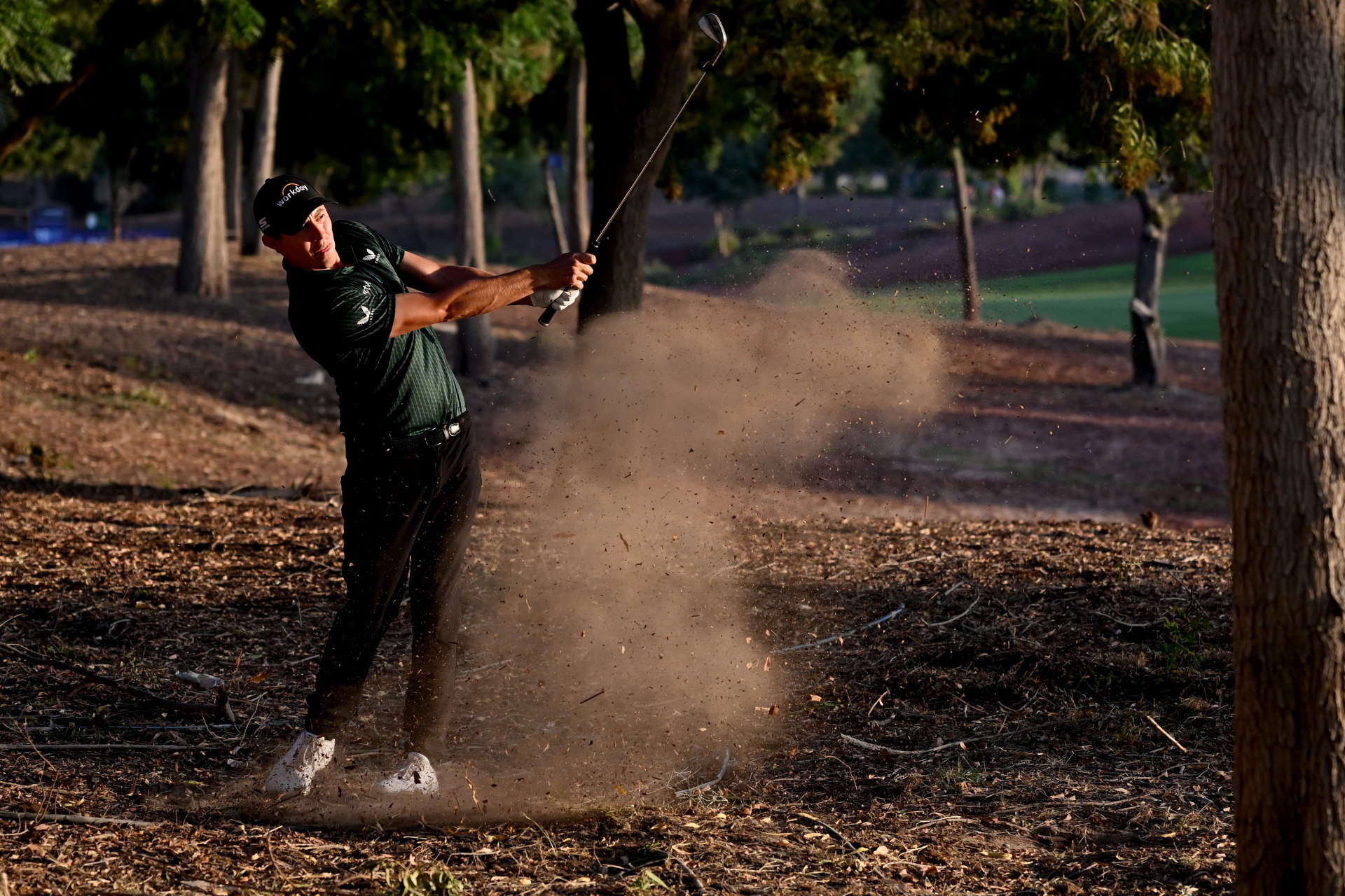 DUBAI, UNITED ARAB EMIRATES - NOVEMBER 18: Matthew Fitzpatrick of England plays his second shot on the 18th hole during Day Two of the DP World Tour Championship on the Earth Course at Jumeirah Golf Estates on November 18, 2022 in Dubai, United Arab Emirates. (Photo by Ross Kinnaird/Getty Images)