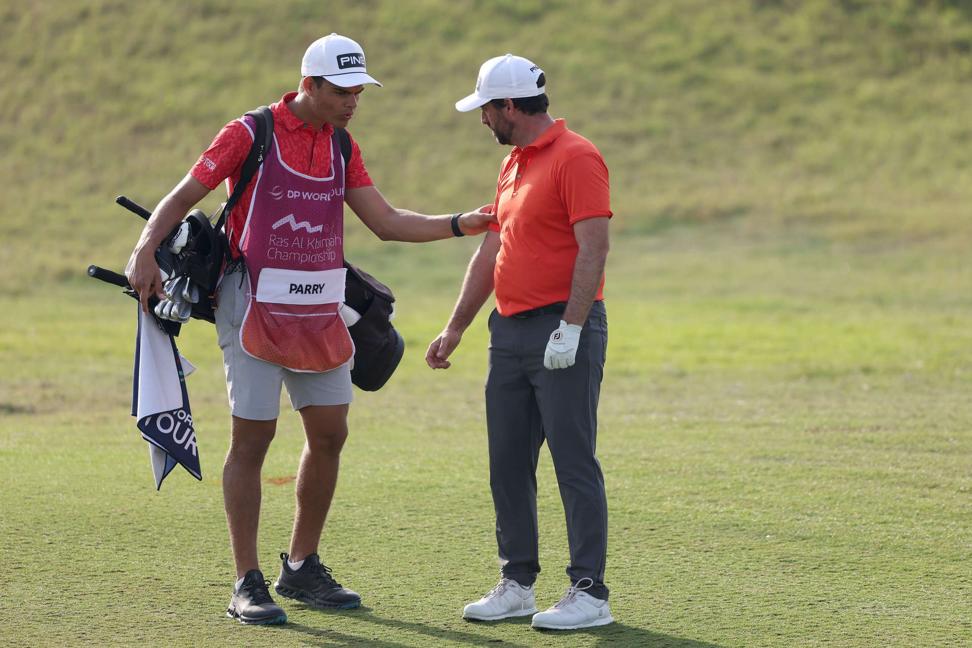 RAS AL KHAIMAH, UNITED ARAB EMIRATES - FEBRUARY 03: John Parry of England plays talks to his caddie on Day Two of the Ras Al Khaimah Championship at Al Hamra Golf Club on February 03, 2023 in Ras al Khaimah, United Arab Emirates. (Photo by Warren Little/Getty Images)