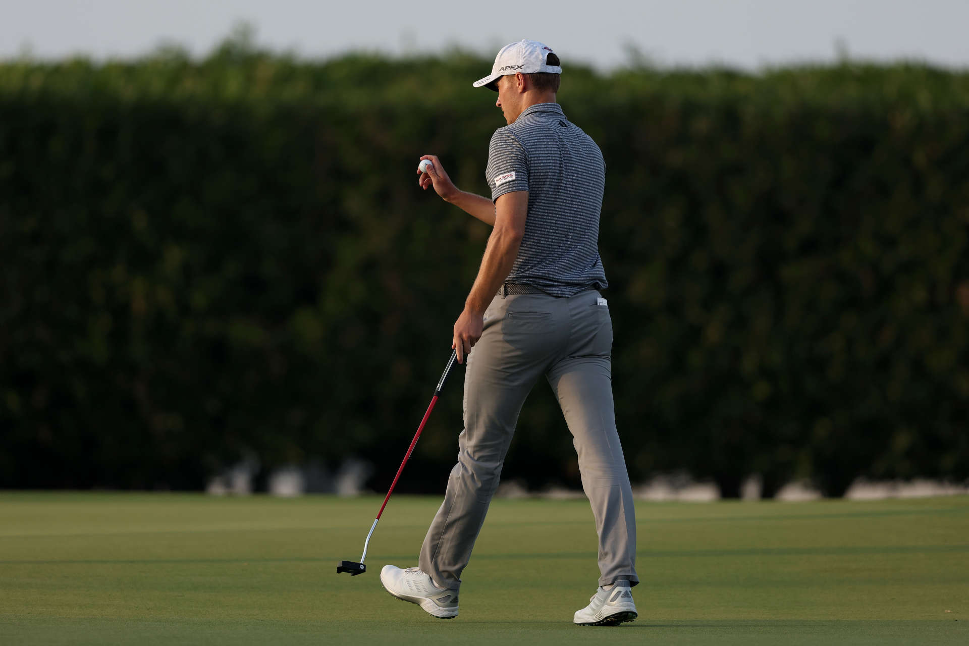 RAS AL KHAIMAH, UNITED ARAB EMIRATES - FEBRUARY 03: Rasmus Hojgaard of Denmark acknowledges the crowd on the 18th Hole on Day Two of the Ras Al Khaimah Championship at Al Hamra Golf Club on February 03, 2023 in Ras al Khaimah, United Arab Emirates. (Photo by Warren Little/Getty Images)