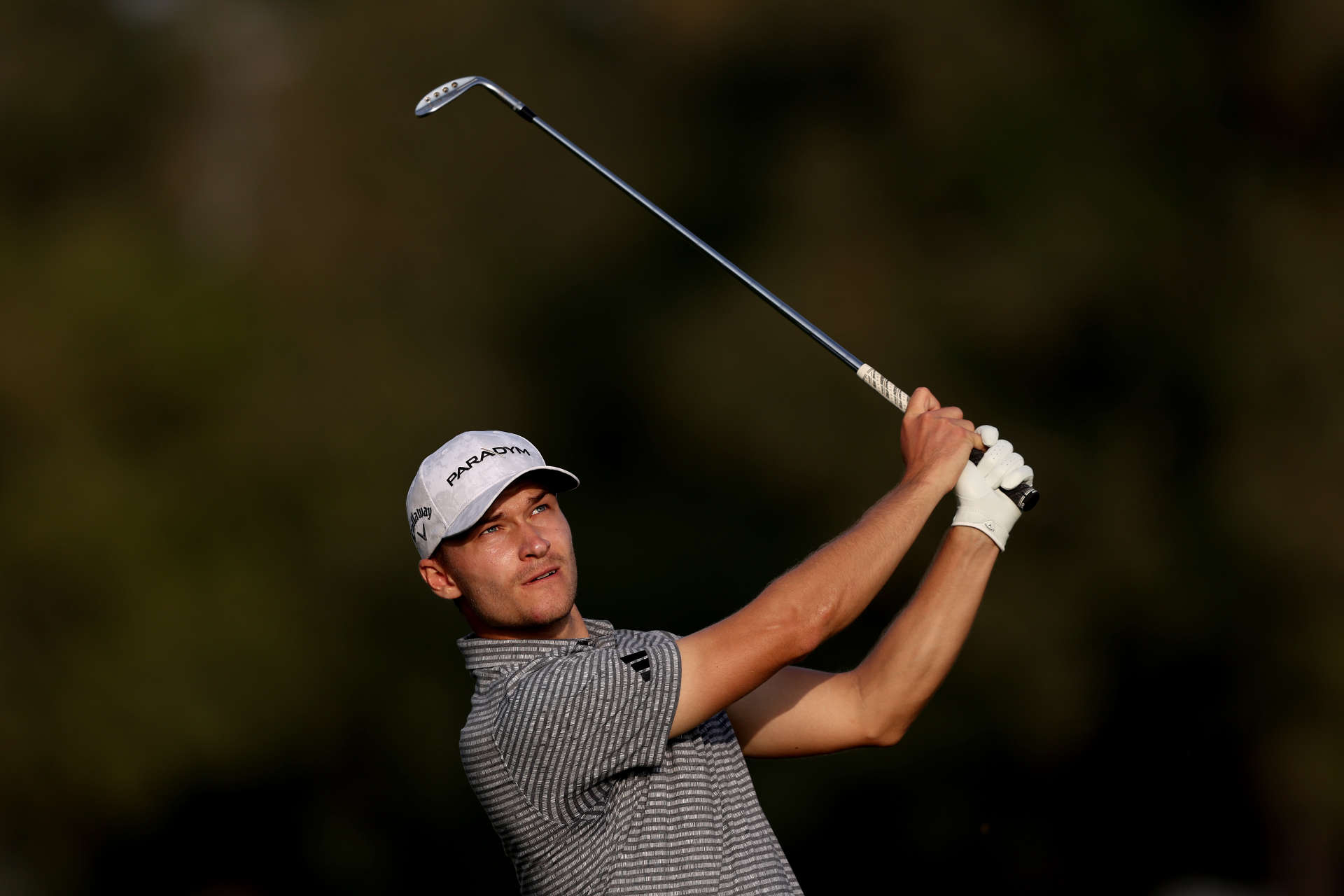 RAS AL KHAIMAH, UNITED ARAB EMIRATES - FEBRUARY 03: Rasmus Hojgaard of Denmark plays his third shot from the 16th Hole on Day Two of the Ras Al Khaimah Championship at Al Hamra Golf Club on February 03, 2023 in Ras al Khaimah, United Arab Emirates. (Photo by Warren Little/Getty Images)